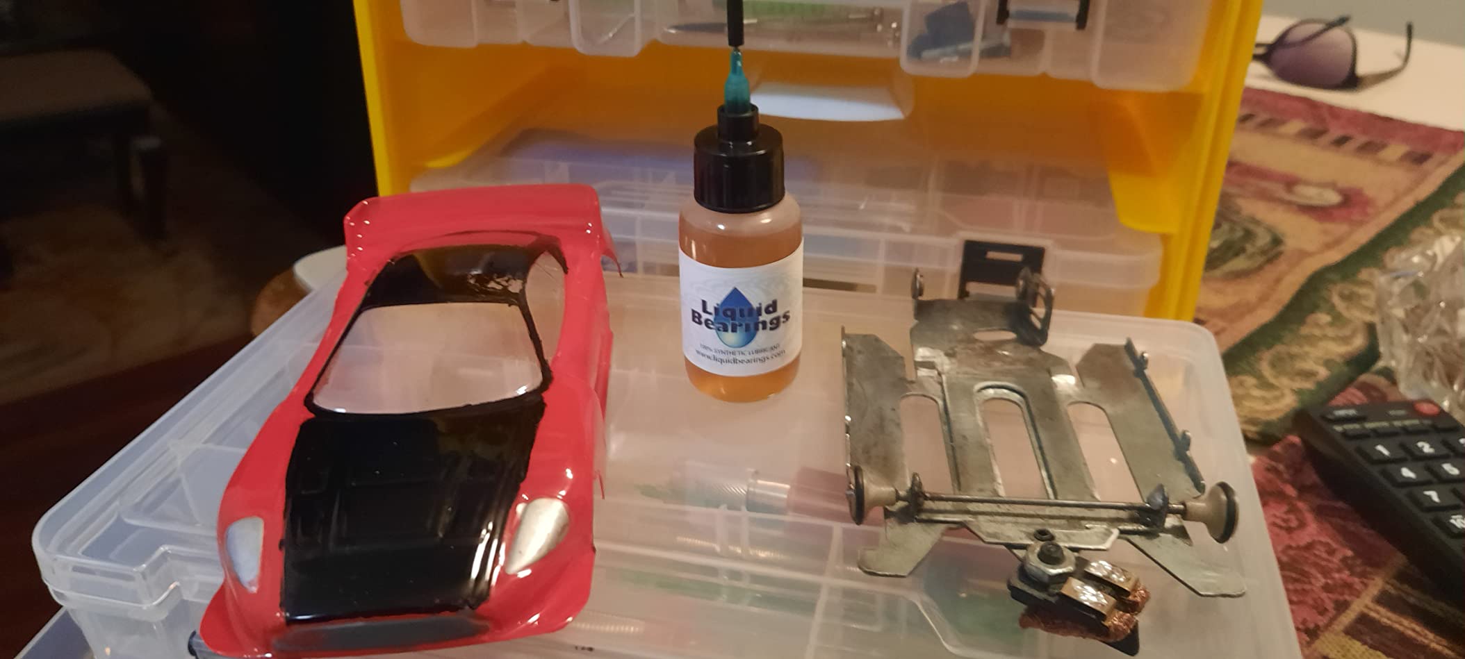 100%-synthetic oil for all HO scale slot cars, makes cars faster!! customer photo 2