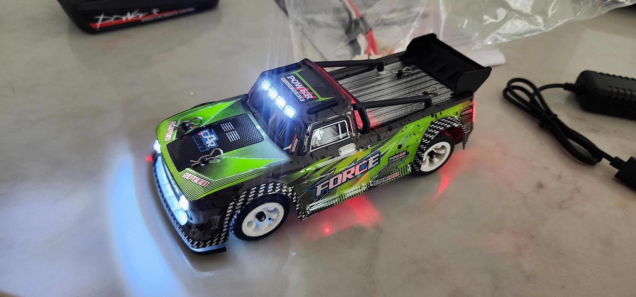 Wltoys 284131 RC Cars 1/28 Mini Drift RC Car with 3pcs Upgraded 500mah Battery 30km/h RC Drift Cars 130 Brushed Motor 2.4GHz Remote Control LED Lamp 4WD Micro RC Drift Car for Adults Gifts customer photo 1