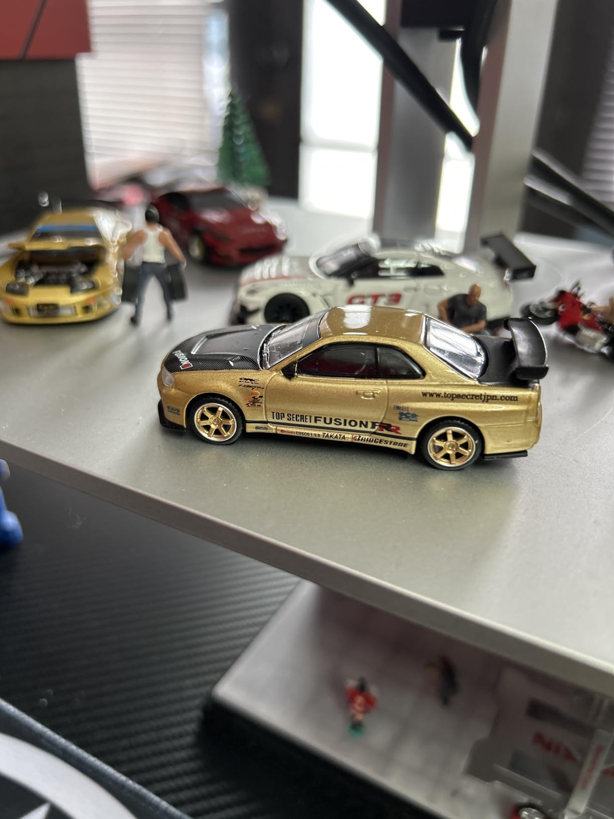 True Scale Miniatures Model Car Compatible with Nissan Skyline GT-R (R34) Top Secret Gold 1/64 Diecast Model Car Mini GT MGT00676-R customer photo 2