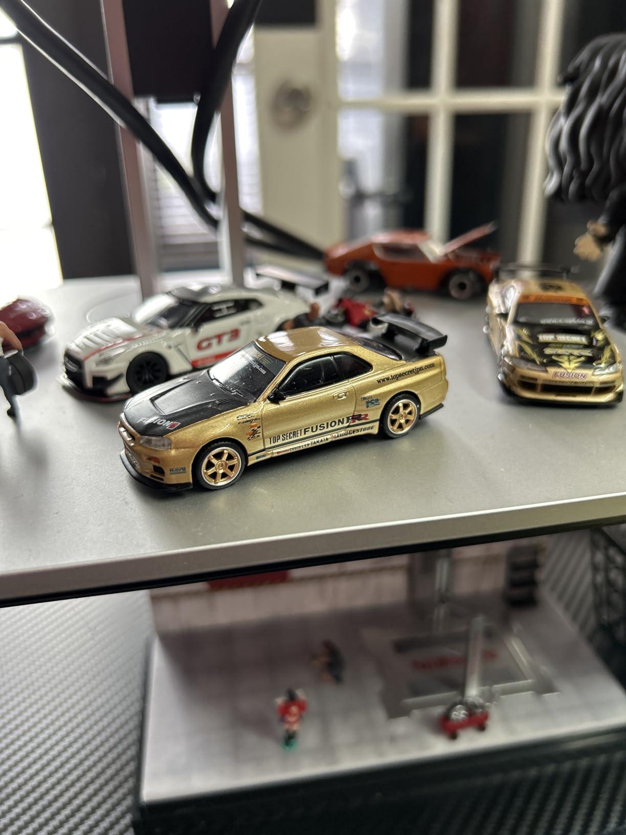 True Scale Miniatures Model Car Compatible with Nissan Skyline GT-R (R34) Top Secret Gold 1/64 Diecast Model Car Mini GT MGT00676-R customer photo 4