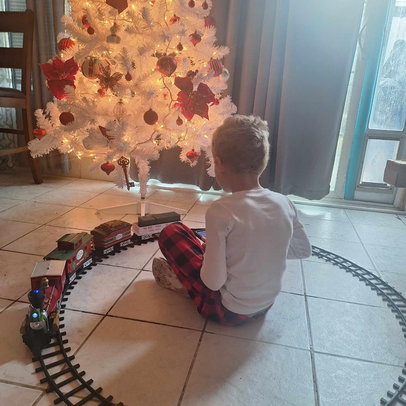 Lionel Battery-Operated North Pole Central Freight Toy Train Set with Bluetooth, Locomotive, Train Cars, & Track with Authentic Train Sounds, Lights, & Water Vapor Smoke Effects for Kids 4+ customer photo 1