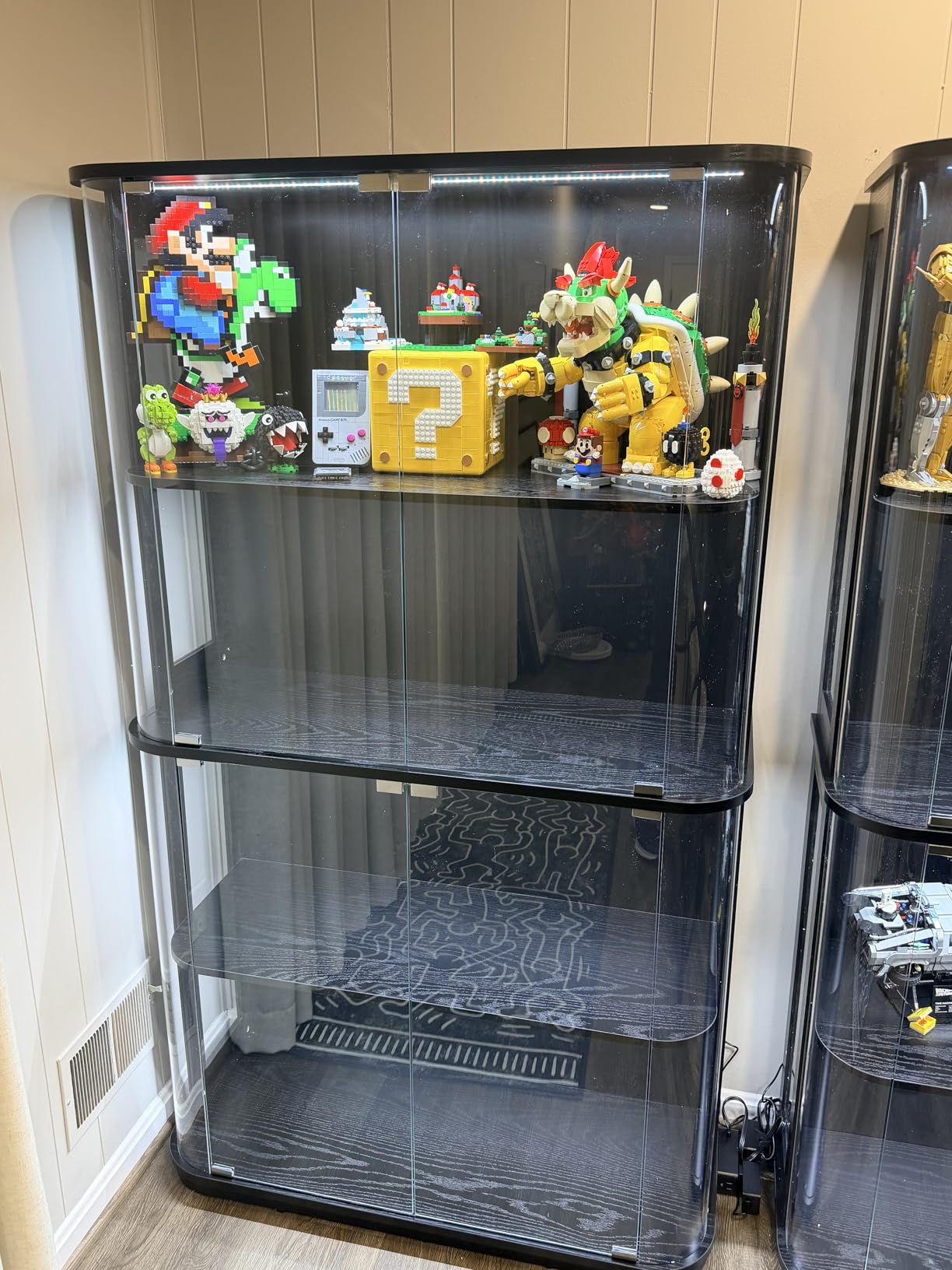 BROTTAR Large Rounded Display Cabinet with Glass Door, 4-Tier Curio Cabinet with 3 Color Lights for Collectibles, Glass Display Case with Transparent Full-Display Surface, Human Body Sensor, Black customer photo 1