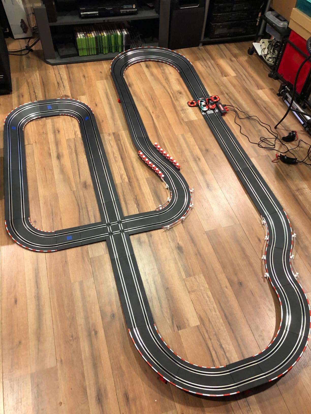 Carrera GO Disney Pixar Cars Slot Car Race Track Toy for Kids Ages 6+ - Electric Powered Racing Set w/Lightning McQueen & Dinoco Cruz Cars, Dual Controllers, Neon Nights Racing Theme customer photo 1