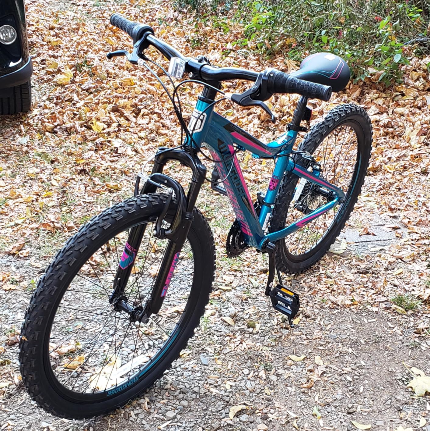 Mongoose Flatrock Mountain Bike, 21 Speed, Aluminum Frame, Knobby Mountain Tires, Suspension Fork, Mechanical Disc Brakes customer photo 1