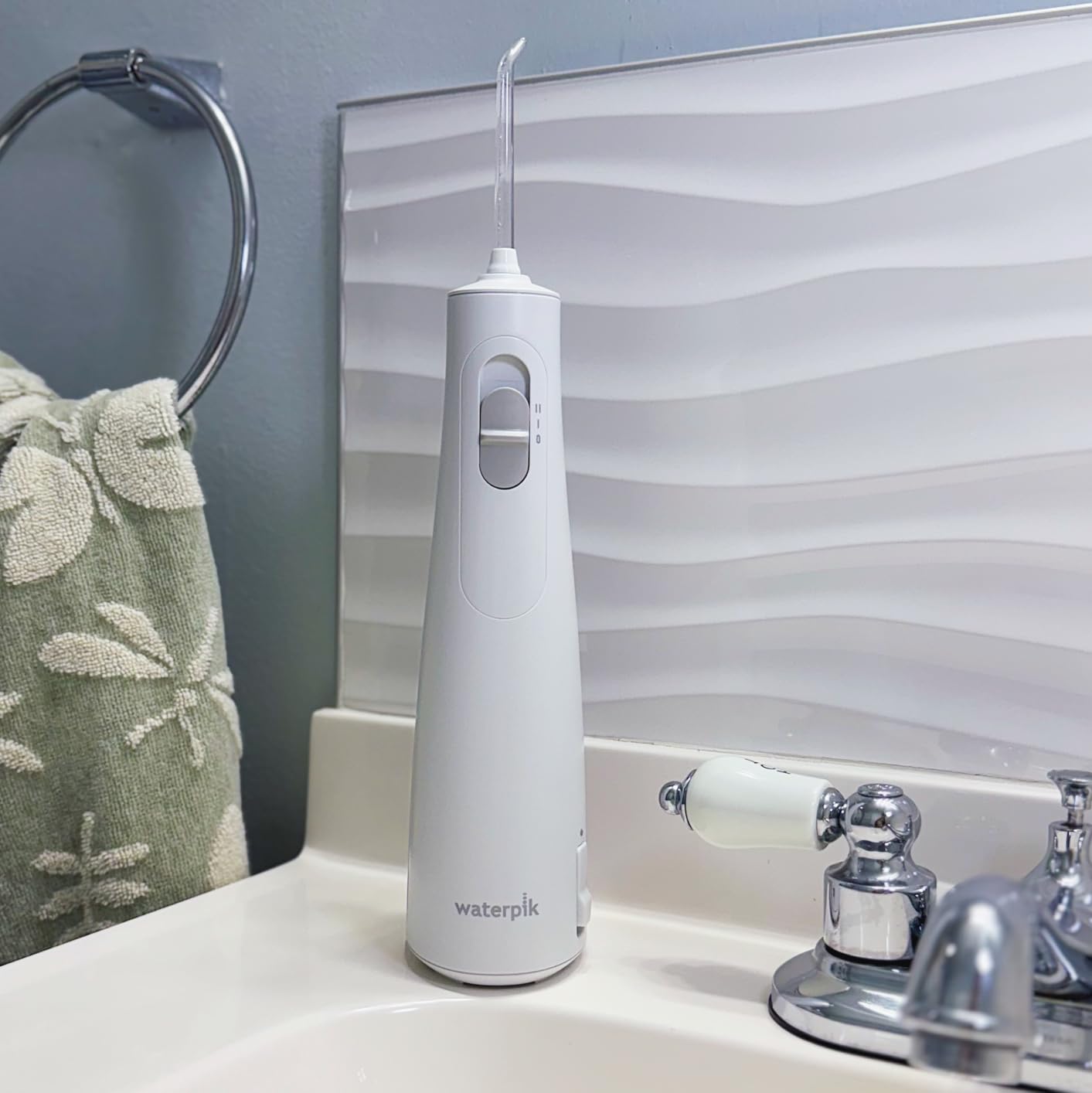 Waterpik Cordless 1100 Rechargeable Portable Water Flosser for Teeth Cleaning and Flossing, Travel, Braces Care, Healthier Gums, Waterproof for Shower, ADA Accepted, WF-30CD White customer photo 1