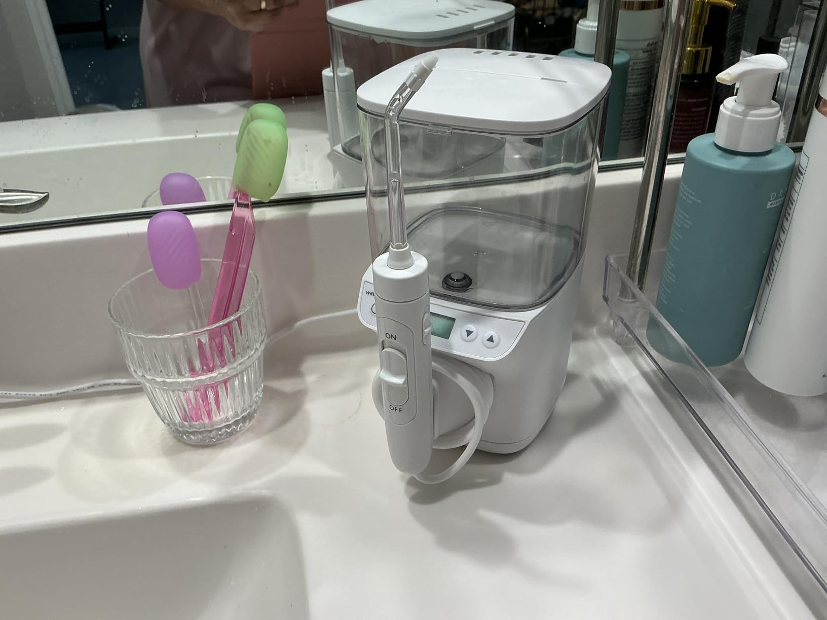 Waterpik Promax Water Flosser with SmartAdvance Mode for Daily Gum Health and Cleaning Teeth, Braces, Implants, ADA Accepted, Small Quiet Design, Electric Flosser with 10 Settings, 5 Tips, WF-23 customer photo 2