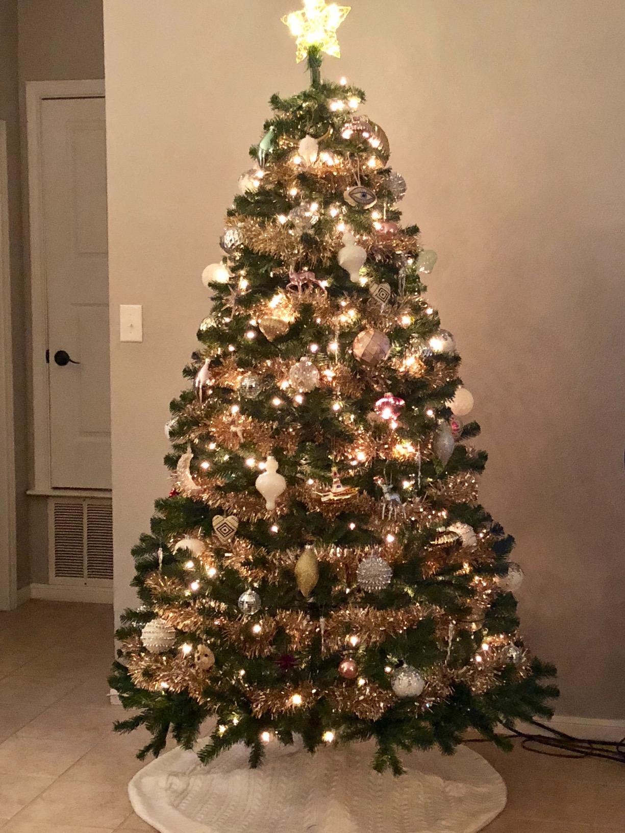 National Tree Company 7.5ft Unlit North Valley Spruce Christmas Tree | 1,346 Tips, Includes Stand, Artificial, Green customer photo 2