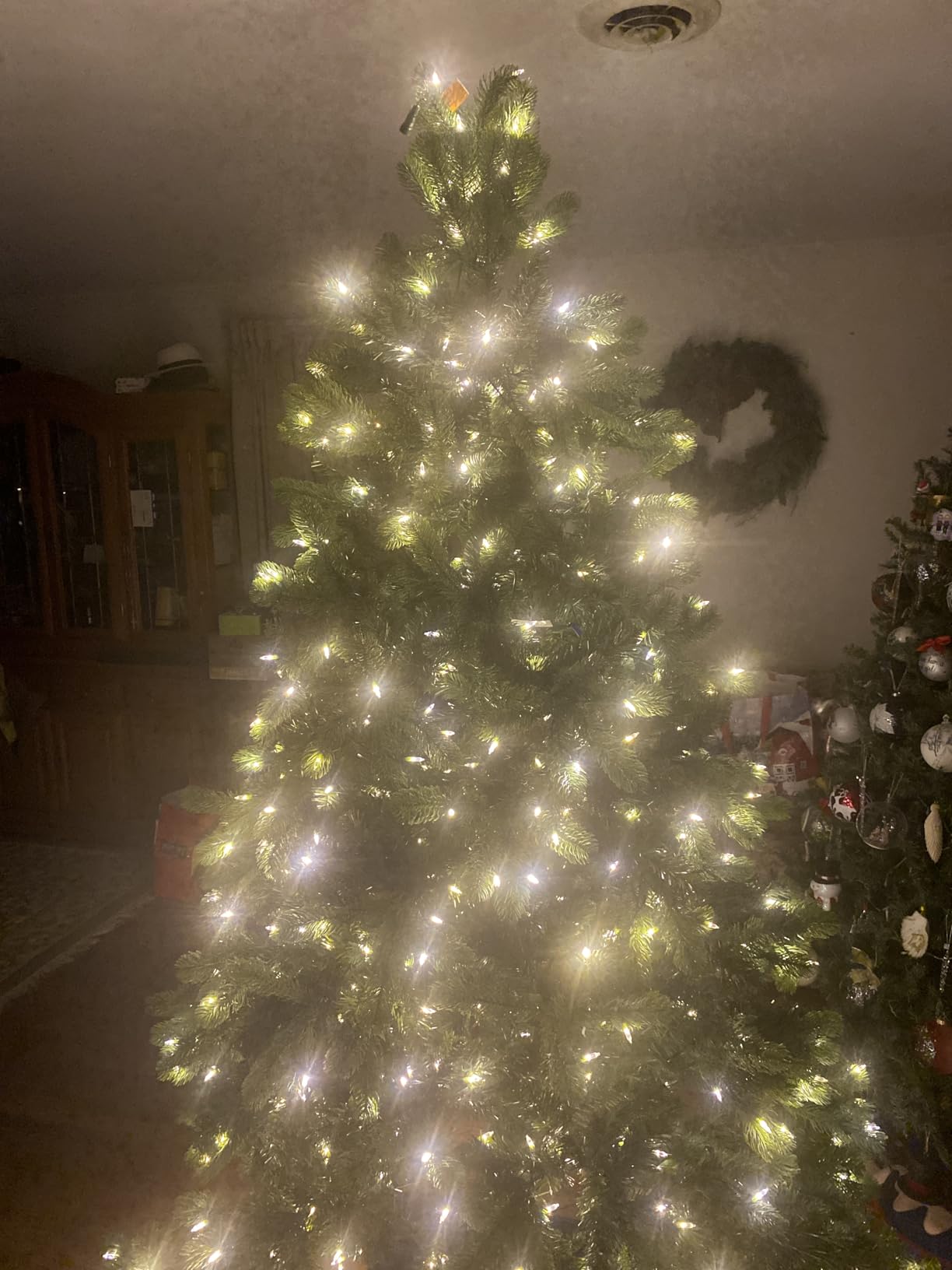 National Tree Company Pre-Lit 'Feel Real' Artificial Full Downswept Christmas Tree, Green, Douglas Fir, Dual Color LED Lights, 7.5 feet | 750 LED Lights, 1,867 Tips, 10 Light Functions, Foot Pedal, Includes Stand customer photo 1