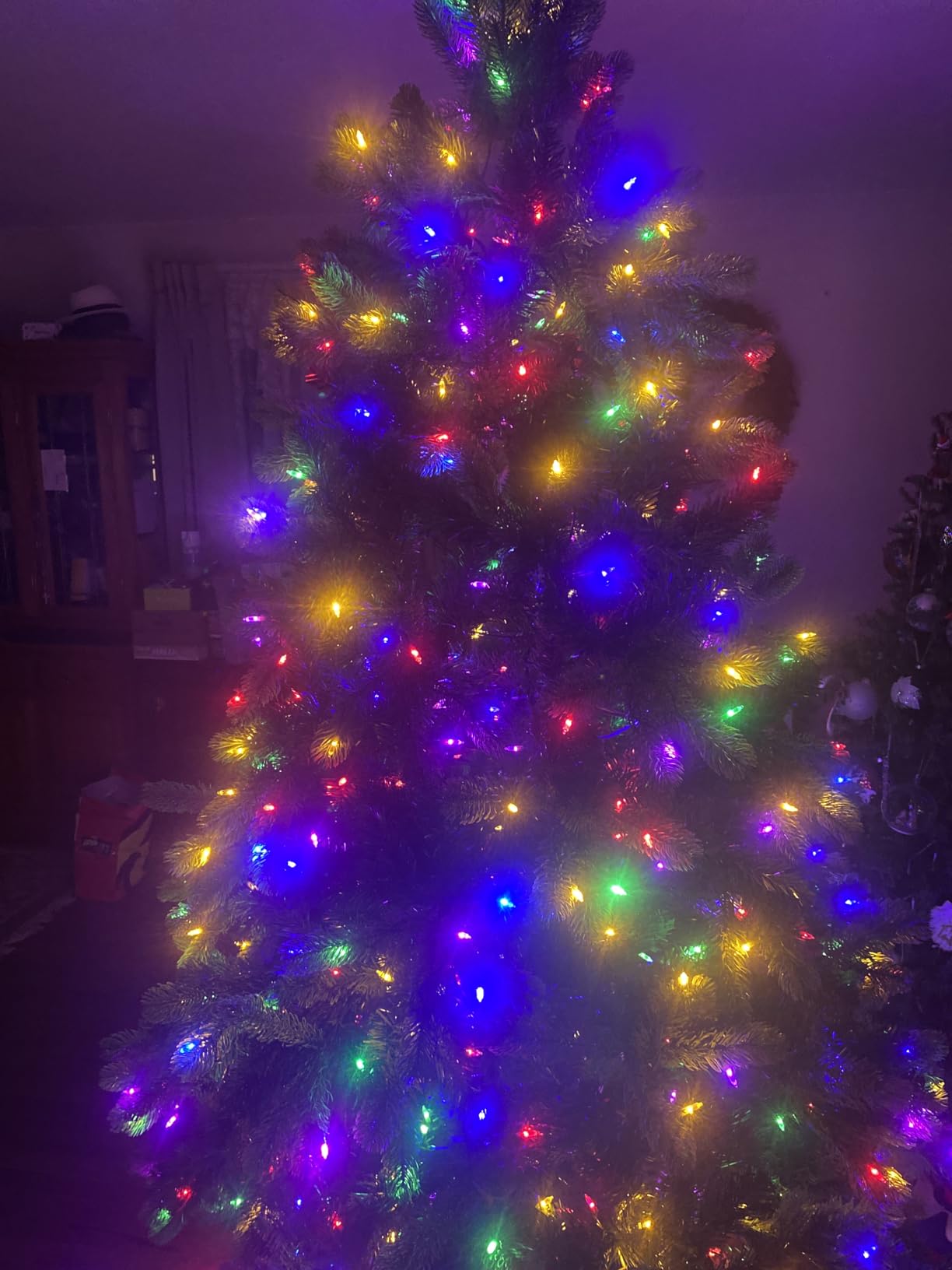 National Tree Company Pre-Lit 'Feel Real' Artificial Full Downswept Christmas Tree, Green, Douglas Fir, Dual Color LED Lights, 7.5 feet | 750 LED Lights, 1,867 Tips, 10 Light Functions, Foot Pedal, Includes Stand customer photo 2