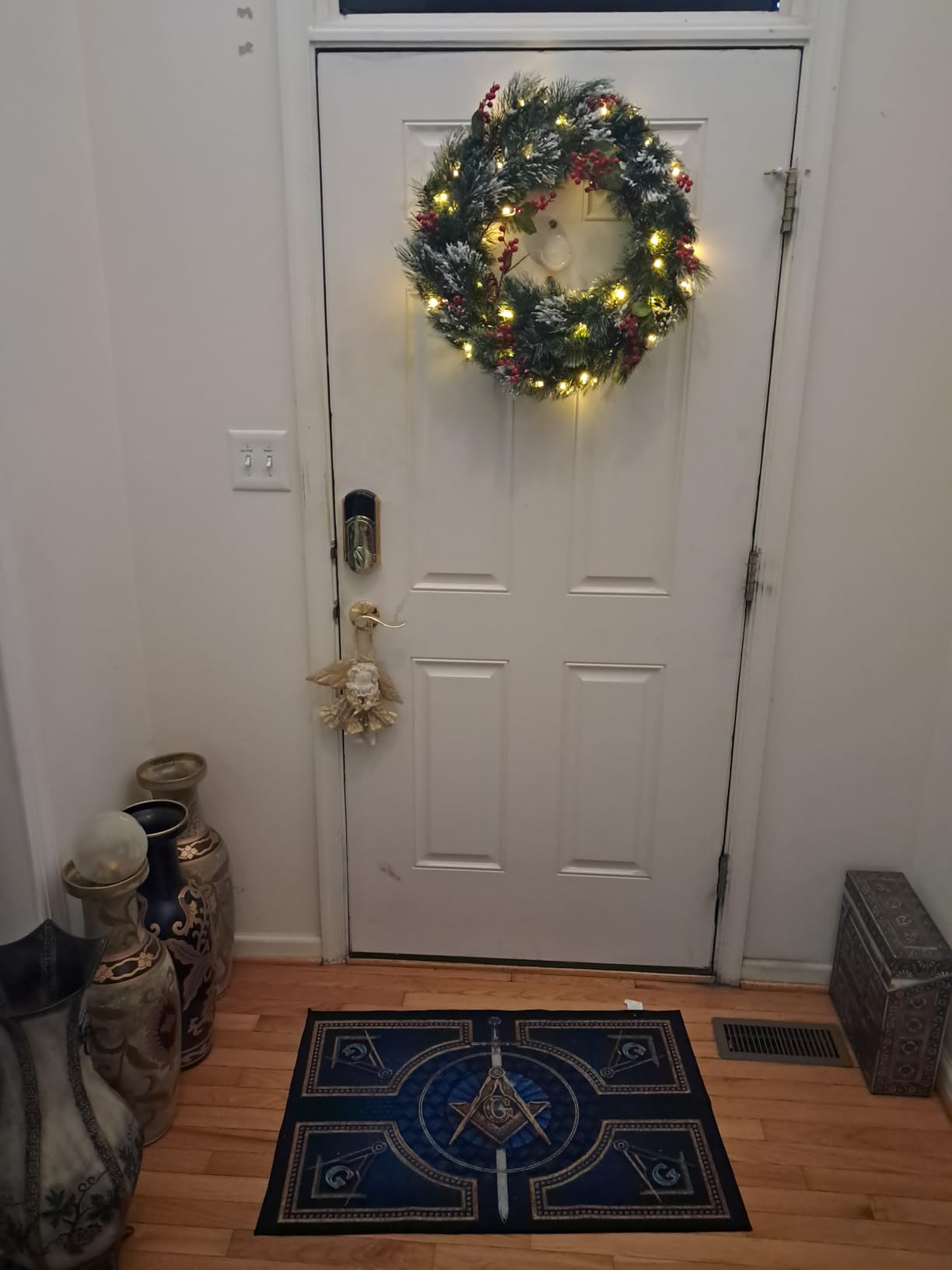 National Tree Company 24 in Pre-Lit Wintry Pine Flocked Artificial Christmas Wreath, Christmas Decoration with Pinecones, Red Berries, 50 Clear LED Lights, 113 Tips, Timer, Green customer photo 1