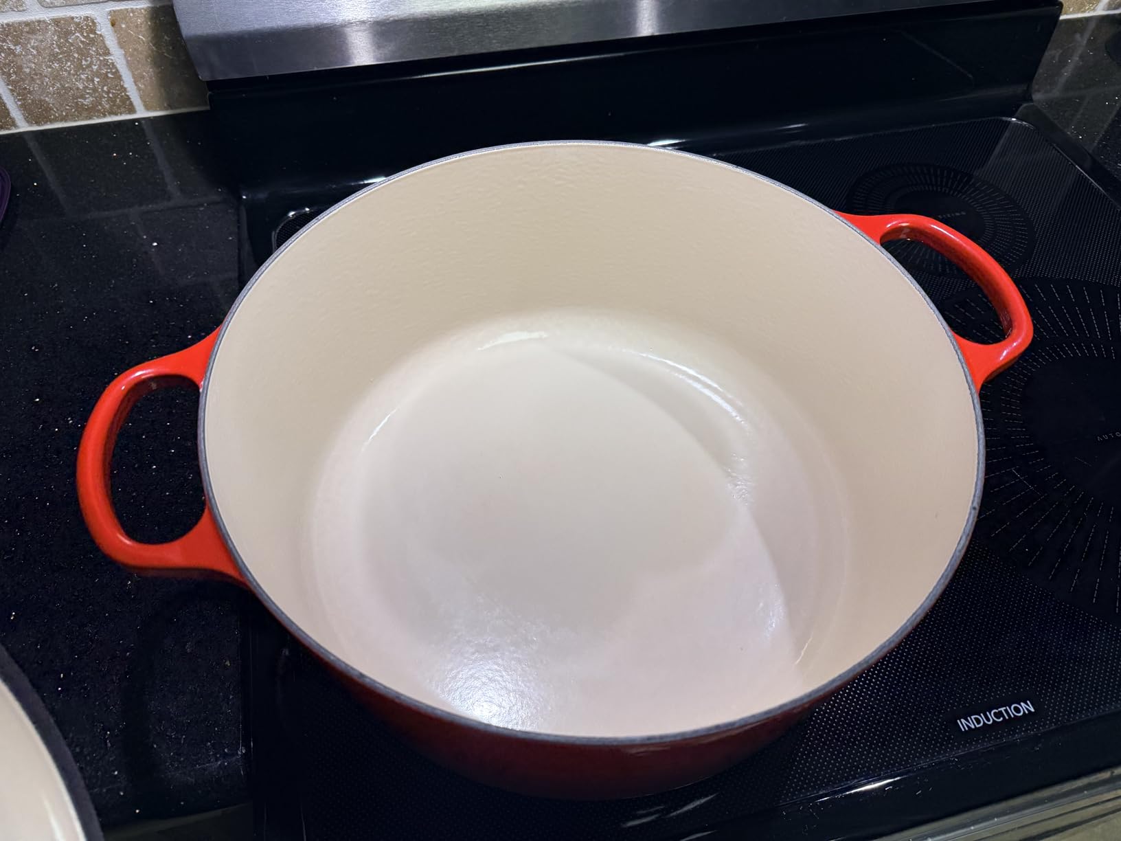 Le Creuset Enameled Cast Iron Signature Round Dutch Oven, 5.5 qt., Flame customer photo 1
