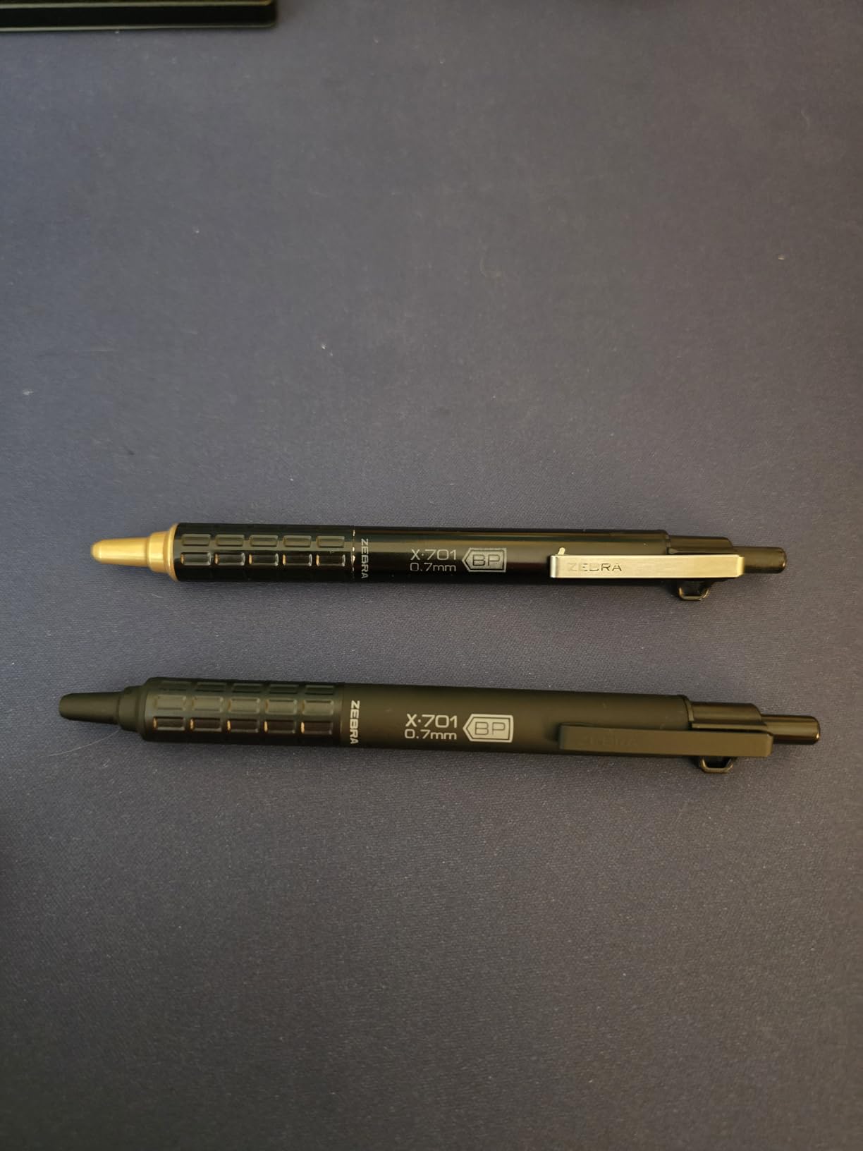 Zebra Pen, X-701 Tactical Ballpoint Pen, Writes in Extreme Conditions, Matte Black Stainless Steel, Refillable, Lanyard Loop, 0.7mm Black Ink, 1-Pack Plus 2 Bonus Refills, (29811) customer photo 1