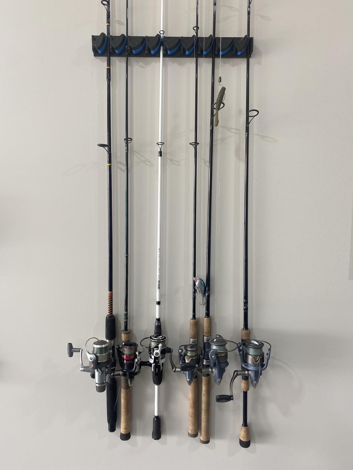 PLUSINNO Vertical Fishing Rod Holder, Wall Mounted Fishing Rod Rack, Fishing Pole Holder Holds Up to 9 Rods or Combos, Fishing Rod Holders for Garage, Fishing Gear and Gifts for Men customer photo 2