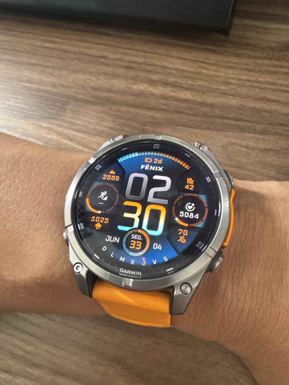 Garmin fēnix® 8 - 47 mm, AMOLED, Sapphire, Premium Multisport GPS Smartwatch, Long-Lasting Battery Life, Dive-Rated, Built-in LED Flashlight, Titanium with Spark Orange/Graphite Band customer photo 1