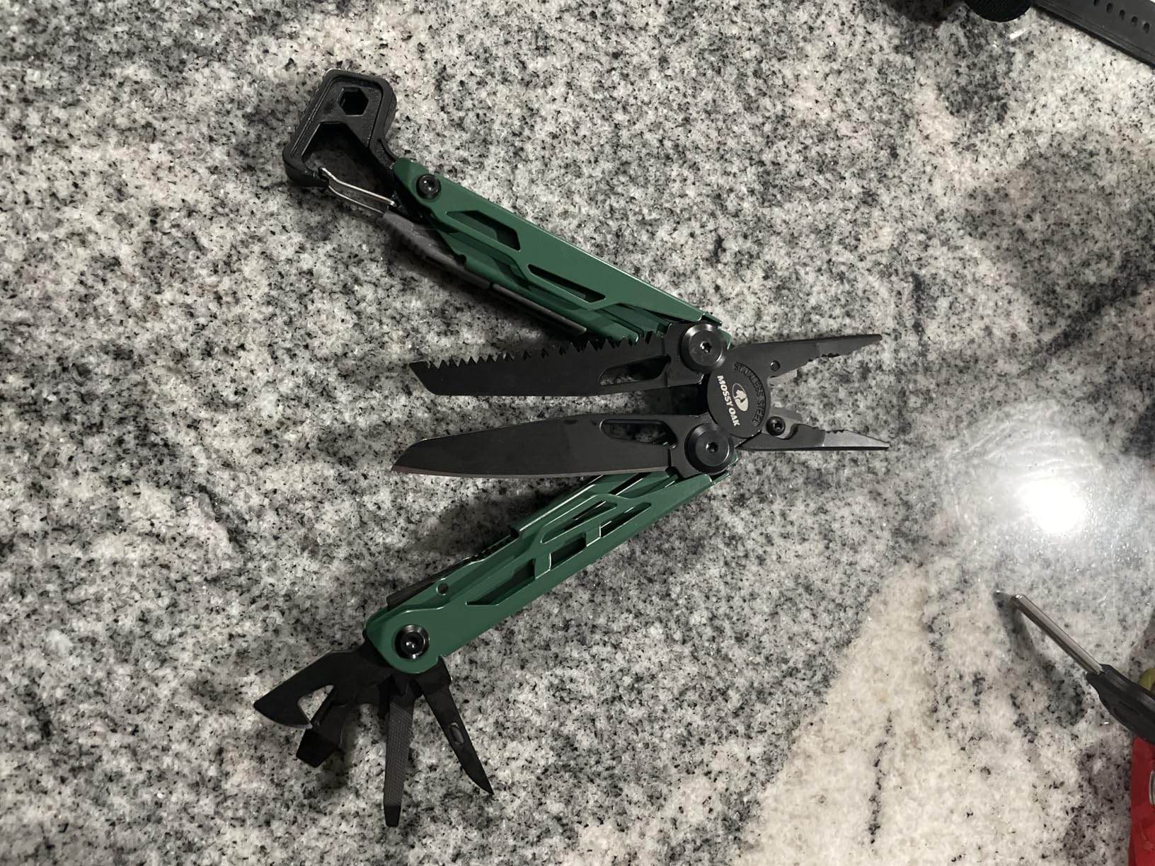 MOSSY OAK CNC-Machined Multitool Pliers, 27-in-1 Multi Tool with Pocket Knife, Fire Starter & Whistle, Bottle Opener, Screwdriver - Self-Locking Survival Tool for Camping & Hiking customer photo 2