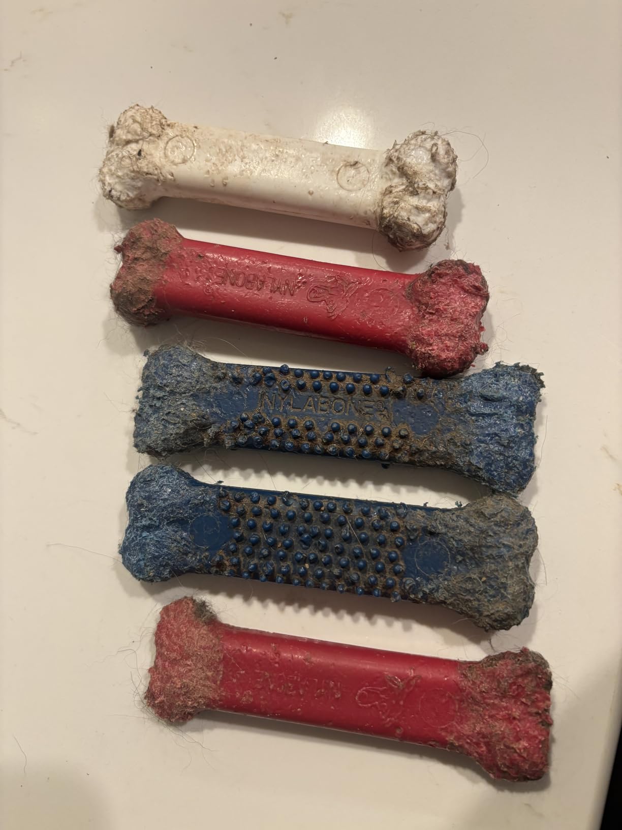 Nylabone Power Chew Textured Bone Dog Chew Toy, Original Flavor, X-Large | Durable dog toys, long lasting, discourages destructive chewing, teeth-cleaning textures, flavor throughout, for dogs 50+ lbs customer photo 1