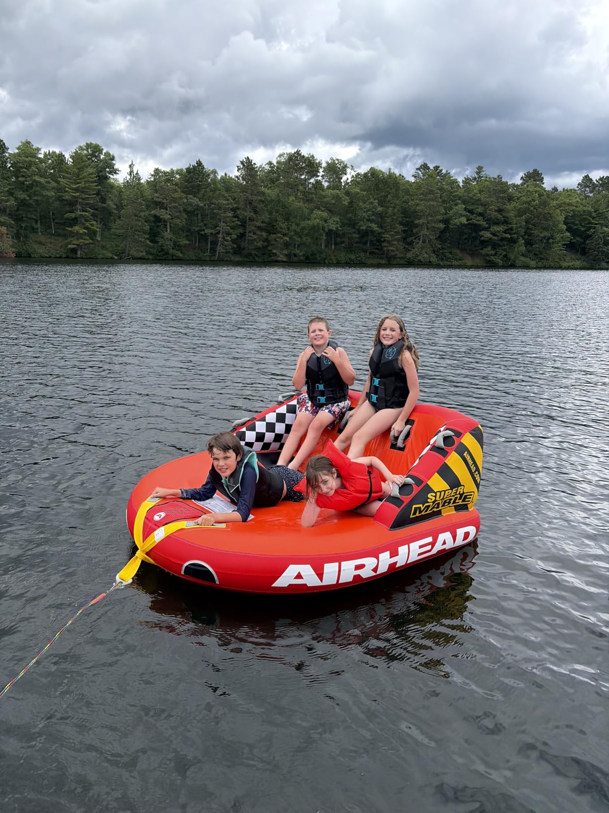 Airhead Mable Towable Tube for Boating, 1-4 Rider Inflatable Boat Tube for Water Tubing, Heavy Duty Full Nylon Cover, EVA Foam Pads, Dual Tow Point, Patented Speed Safety Valve customer photo 1