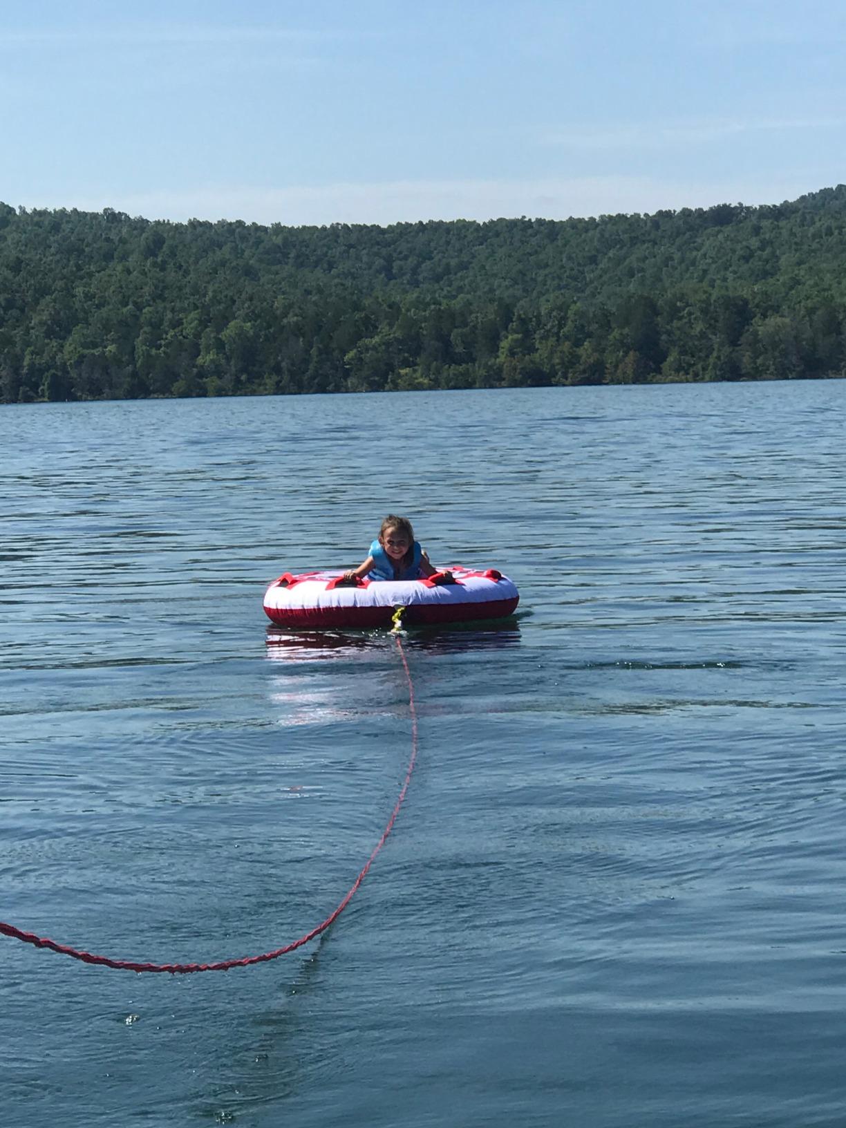 Airhead Hot Shot Towable Tube for Boating, 1 - 2 Rider Inflatable Boat Tube for Water Tubing, Round Deck for Air Time, Full Nylon Cover, Padded Handles with Neoprene Knuckle Guards, Speed Safety Valve customer photo 2