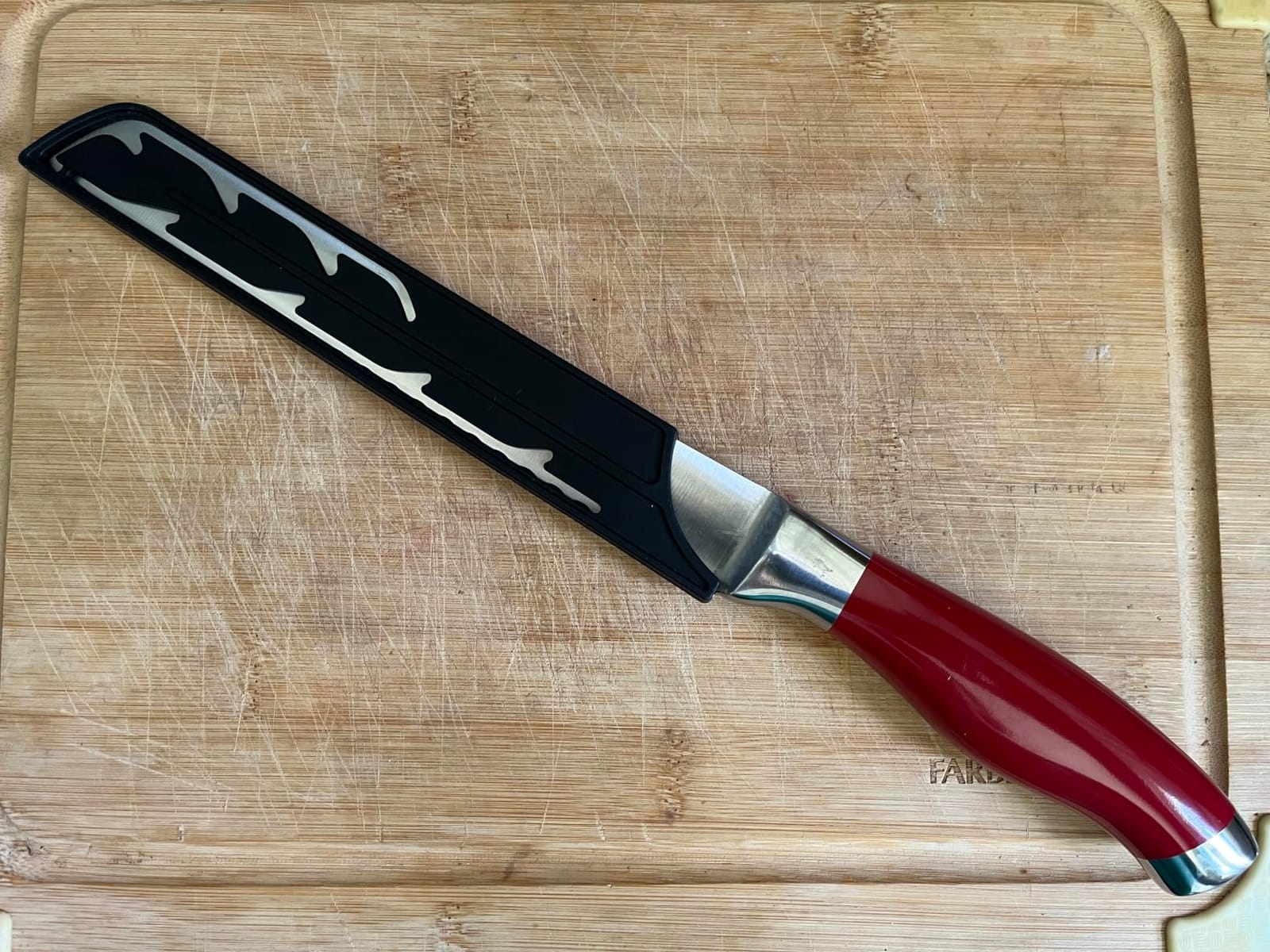 Orblue Serrated Bread Knife with Upgraded Stainless Steel Razor Sharp Wavy Edge - Bread Cutter Ideal for Slicing Homemade Bagels, Cake (8-Inch Blade with 5-Inch Handle) customer photo 1
