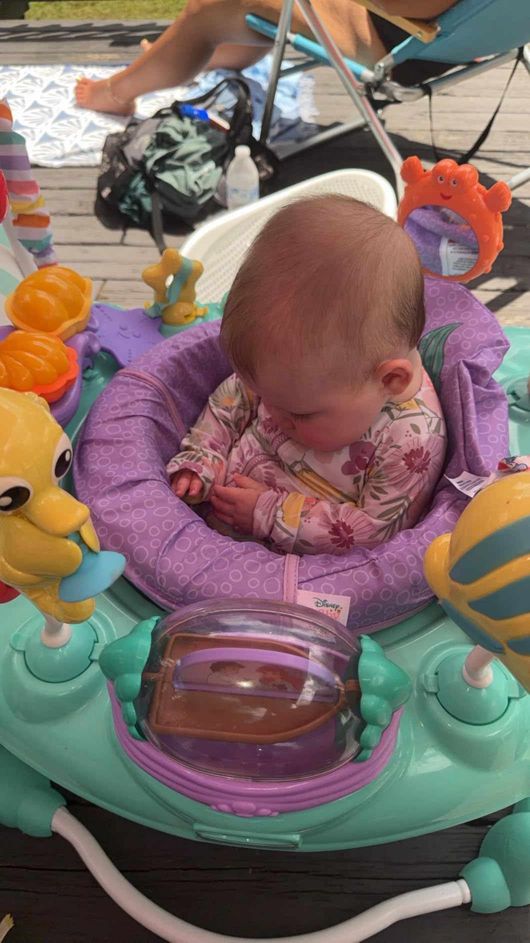 Bright Starts Disney Baby Finding Nemo Sea of Activities Baby Activity Center Jumper with Interactive Toys, Lights, Songs & Sounds, 6-12 Months (Blue) customer photo 1