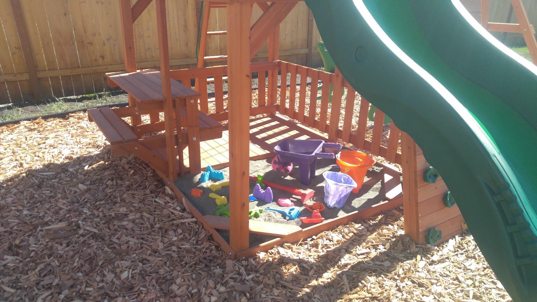 Backyard Discovery Skyfort II Cedar Wood Swing Set with Wave Slide, Raised Clubhouse, Crow's Nest, Monkey Bars, Balcony, Belt Swings, Trapeze, Rock Wall, Picnic Table, Sandbox, Ladder, Outdoor Playset customer photo 2