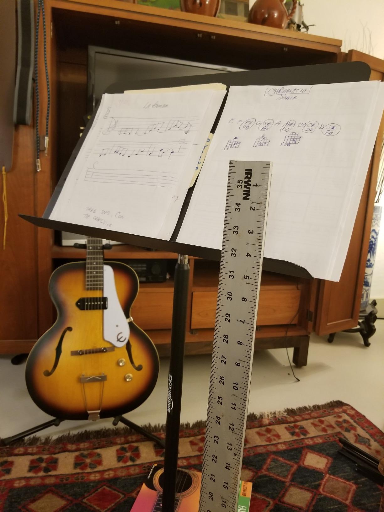 Amazon Basics Portable Height Adjustable Sheet Music Stand, Sturdy Metal, Black customer photo 1
