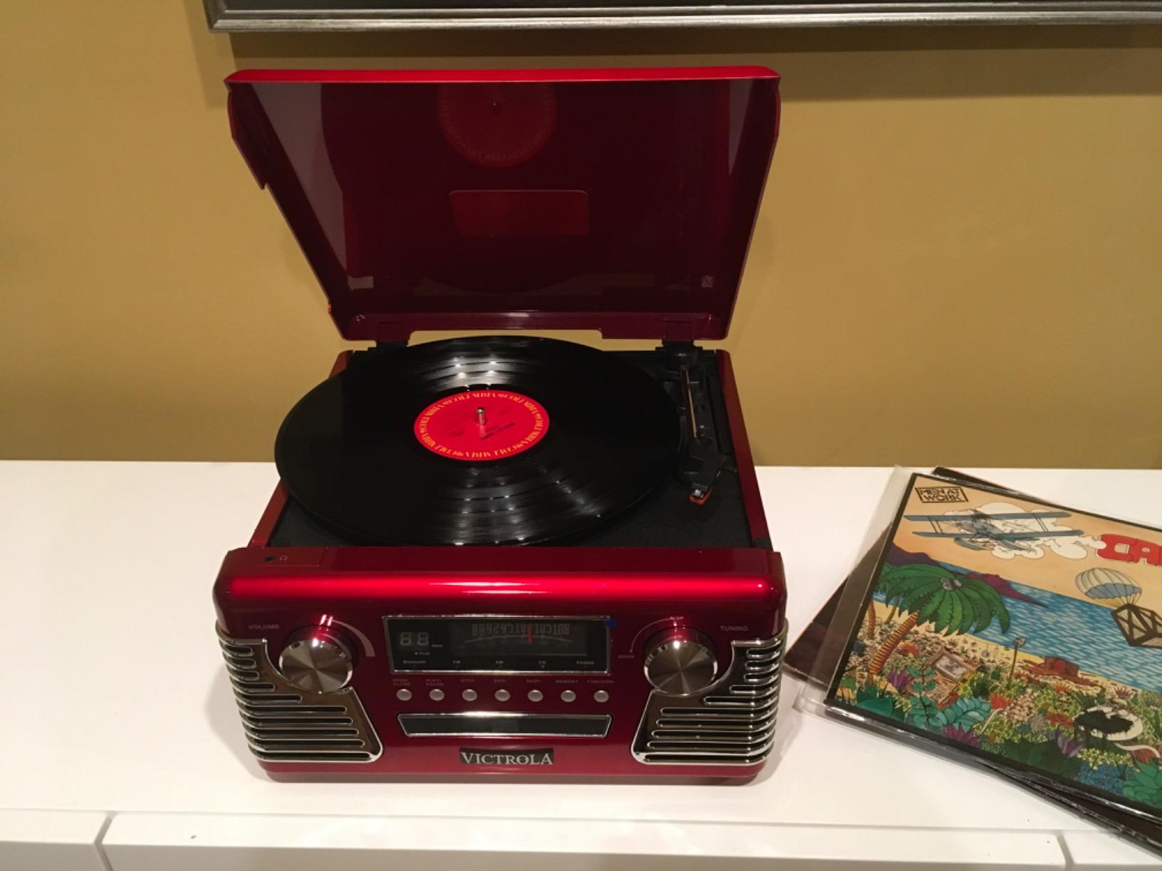 Victrola Haley - Retro Bluetooth Record Player with CD Player - Red | Plays vinyl, CD and AM/FM radio through built-in stereo speakers, 1950s retro design, Bluetooth and aux streaming customer photo 1