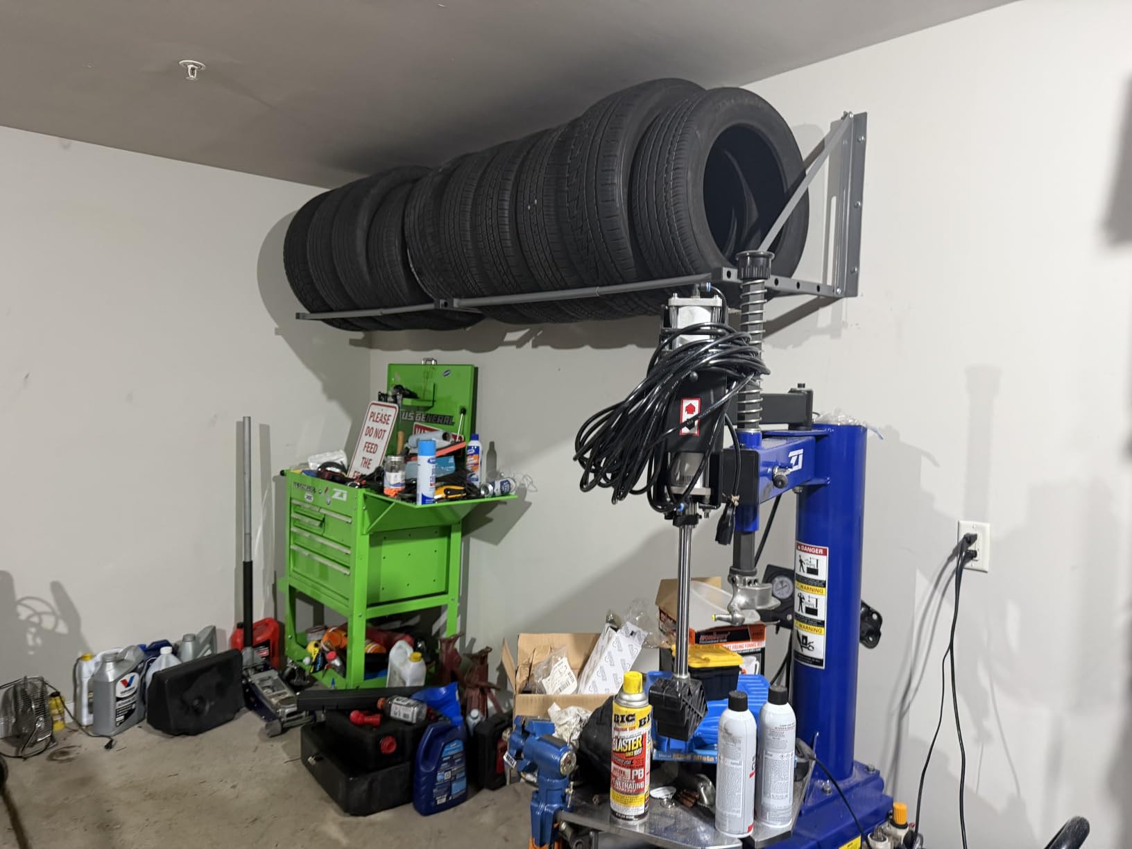 MaxxHaul Adjustable Wall Mount Folding Tire Rack - 32 to 48 Inch Width - 300 lb Capacity - Heavy Duty Steel Garage Tire Storage Holds 4 Tires - 70489 customer photo 1