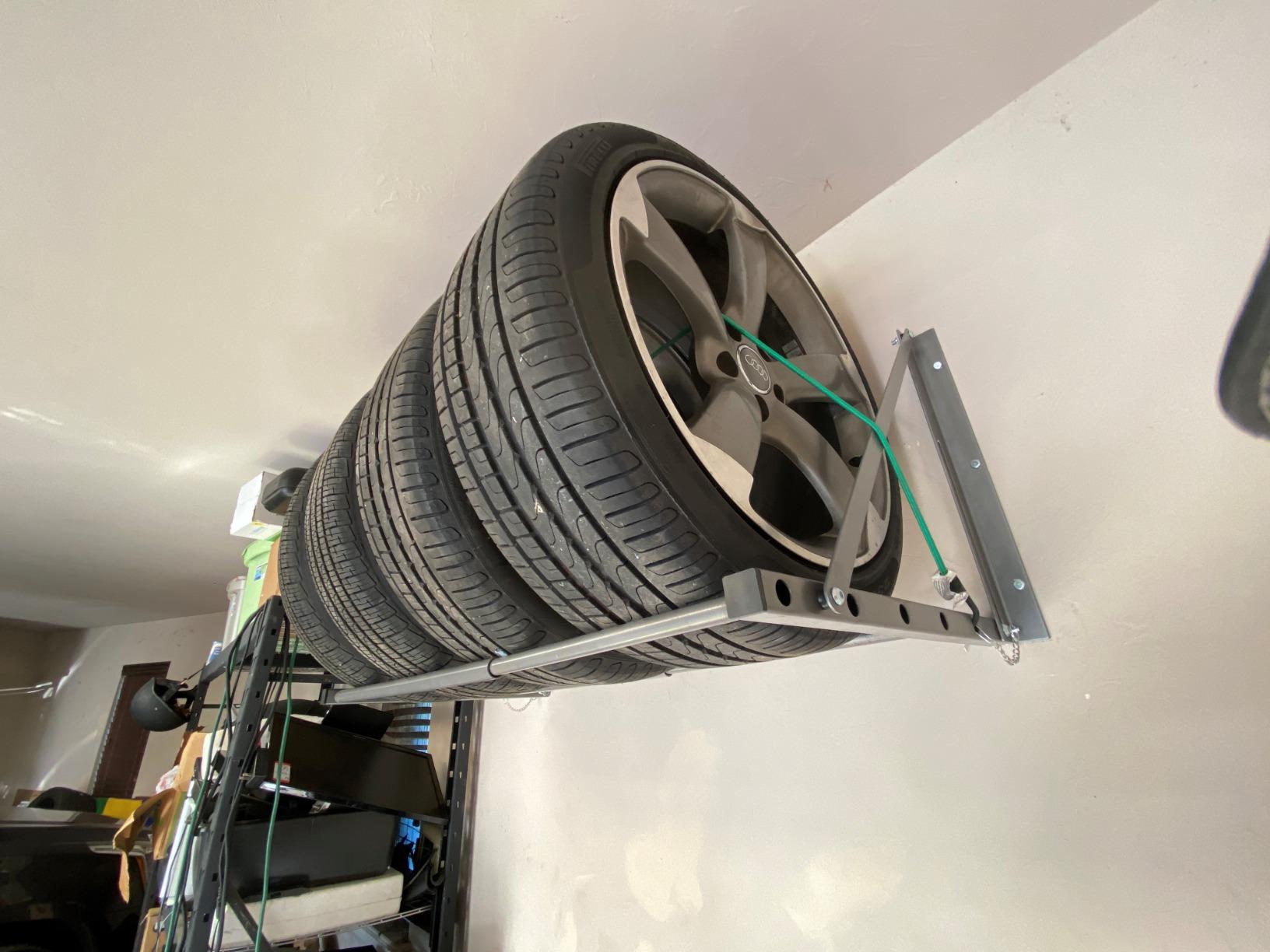 MaxxHaul Adjustable Wall Mount Folding Tire Rack - 32 to 48 Inch Width - 300 lb Capacity - Heavy Duty Steel Garage Tire Storage Holds 4 Tires - 70489 customer photo 2