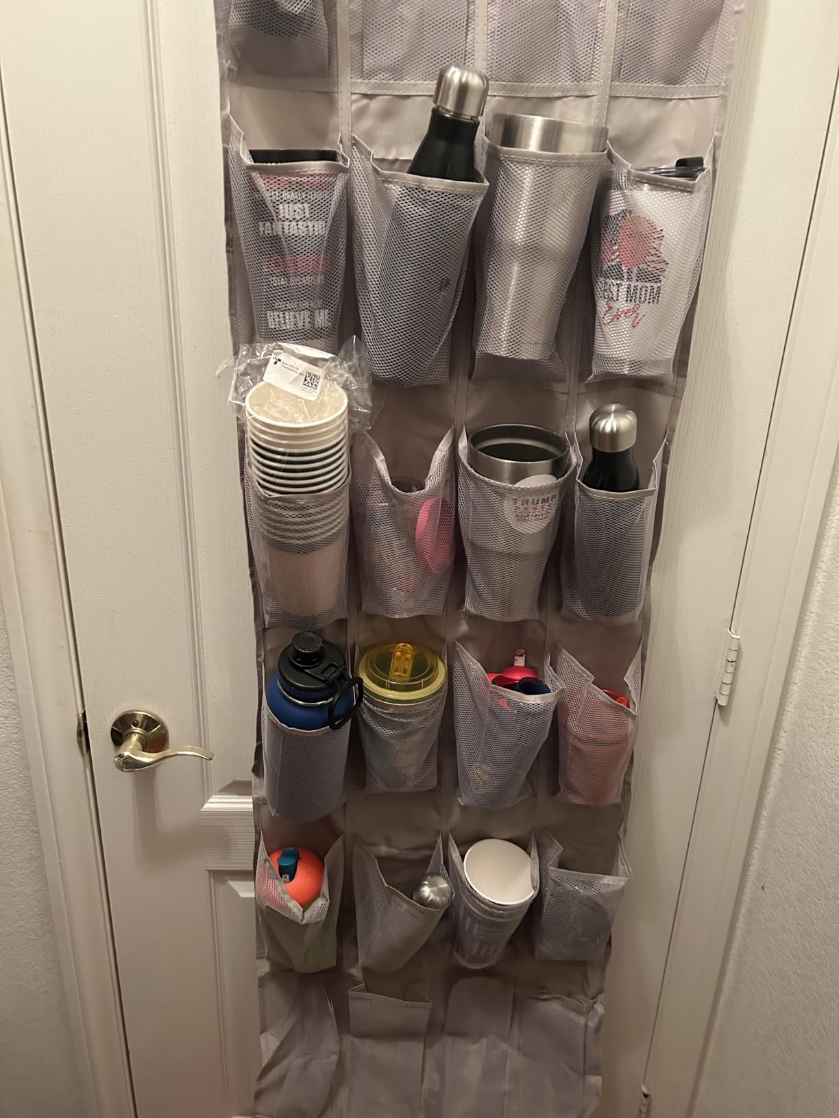 Amazon Basics 24 Medium Mesh Pocket Over-the-Door Hanging Shoe Organizer, Space Saving Shoe Storage, Light Grey customer photo 1