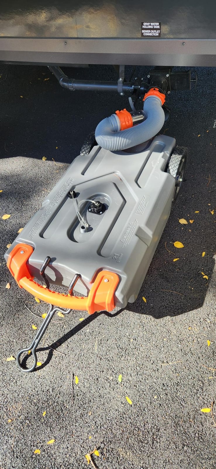 Camco Rhino 15-Gal RV Portable Tote Tank - Made in the USA | Large Heavy-Duty No-Flat Wheels & Low Drain Hole - Removable Steel Tow Adapter - 3' Sewer Hose & More RV Accessories (39000) customer photo 1