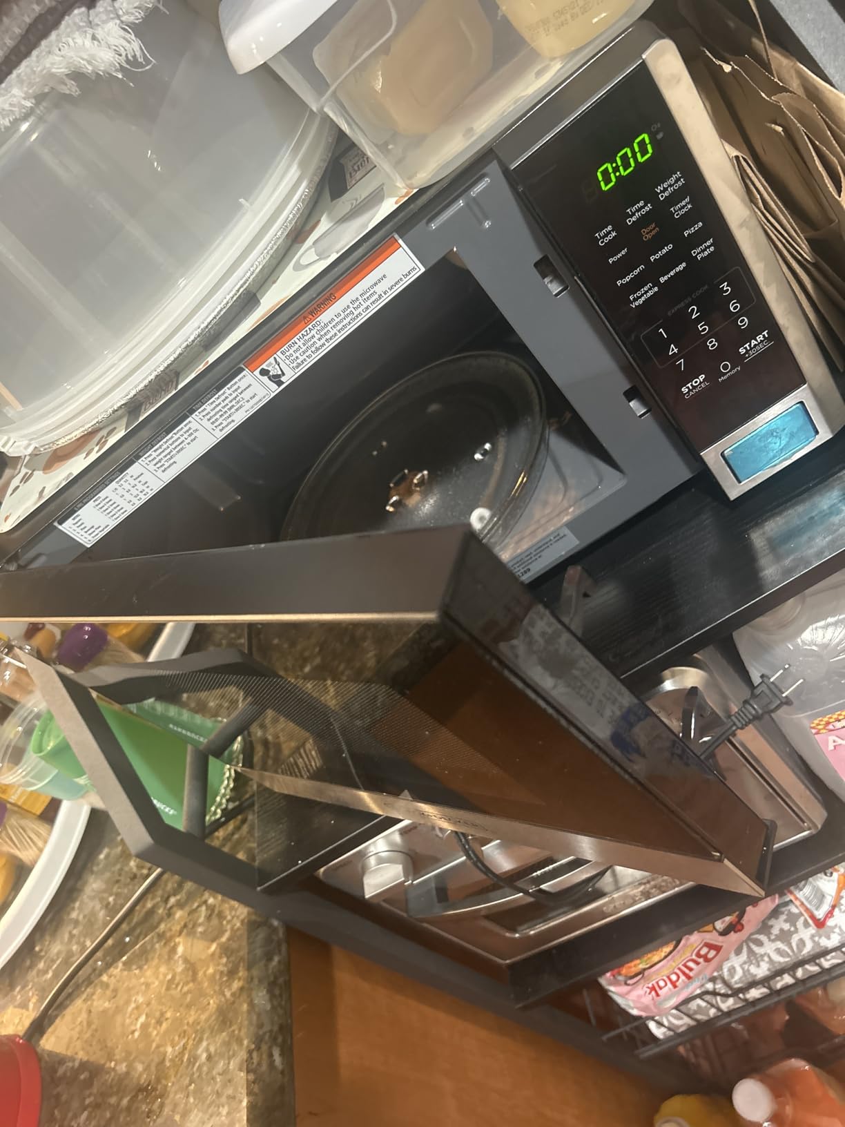 BLACK+DECKER Countertop Microwave Oven, 0.9 Cu.Ft, 900W, Stainless Steel | 10 Power Levels, Push-Button Door, Child Safety Lock, Countertop, 6 Auto Cook Presets customer photo 2
