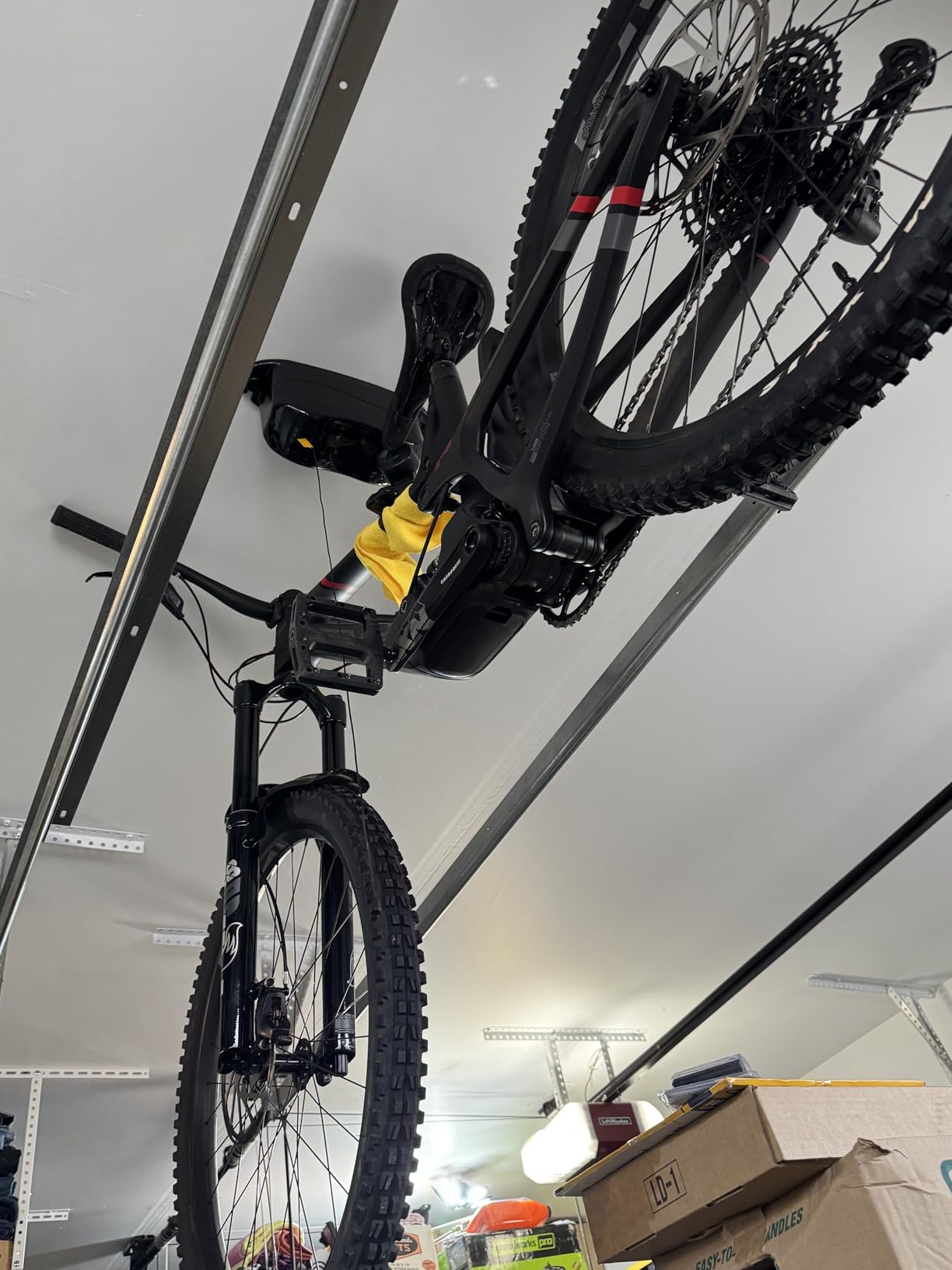 Kradl - Spring-Powered Ceiling Bike Hoist and Rack for Effortless Storage | Hanging Bicycle Lift Without Electricity, Clumsy Ropes, or Manual Pulleys. Select 40lb or 25lb Capacity Model customer photo 1