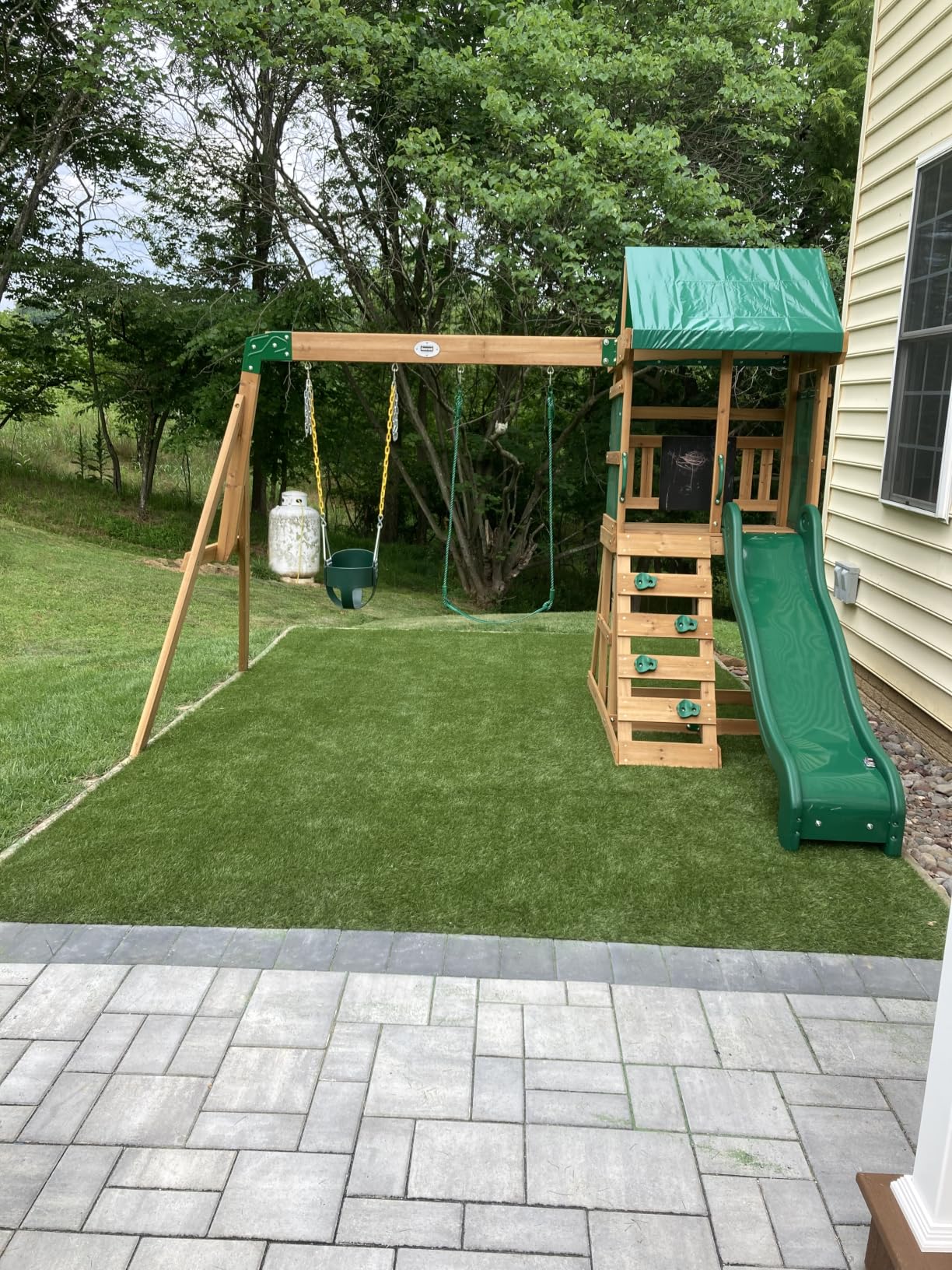 Backyard Discovery Buckley Hill Cedar Wood Swing Set with Wave Slide, Play Deck, Rock Wall Ladder, Belt Swings, Chalkboard, Canopy Roof, Outdoor Playset customer photo 1