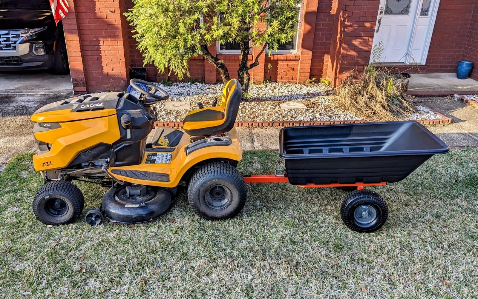Agri-Fab Tow Behind Poly Dump Swivel Cart for Lawn Tractors and Mowers, 700 lb Capacity, 12 Cu Ft Utility Trailer customer photo 1