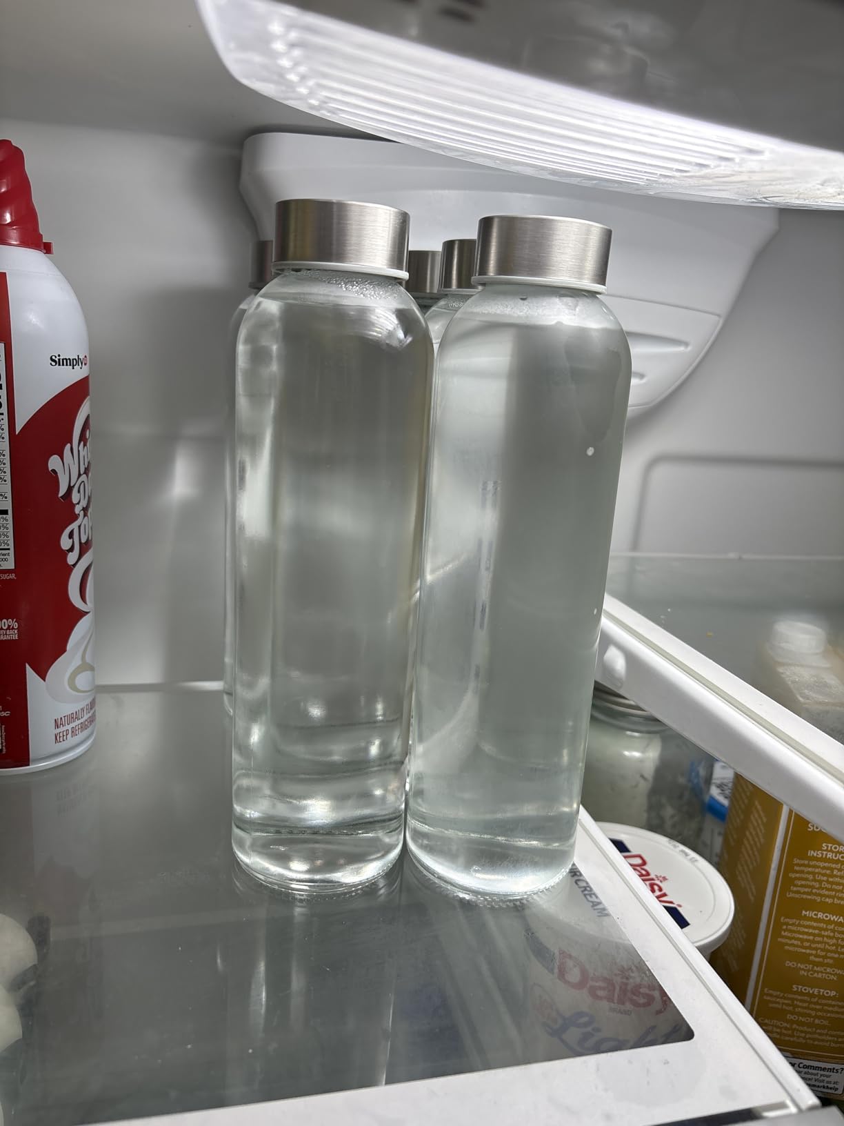 Epica Clear Glass Bottles with Lids, 18 oz Water Bottles, with sleeves | Reusable Travel-Friendly Juice bottles Rust-Resistant Durable Glass Stainless steel Air and Water Tight Lids 100% Leak Proof customer photo 2