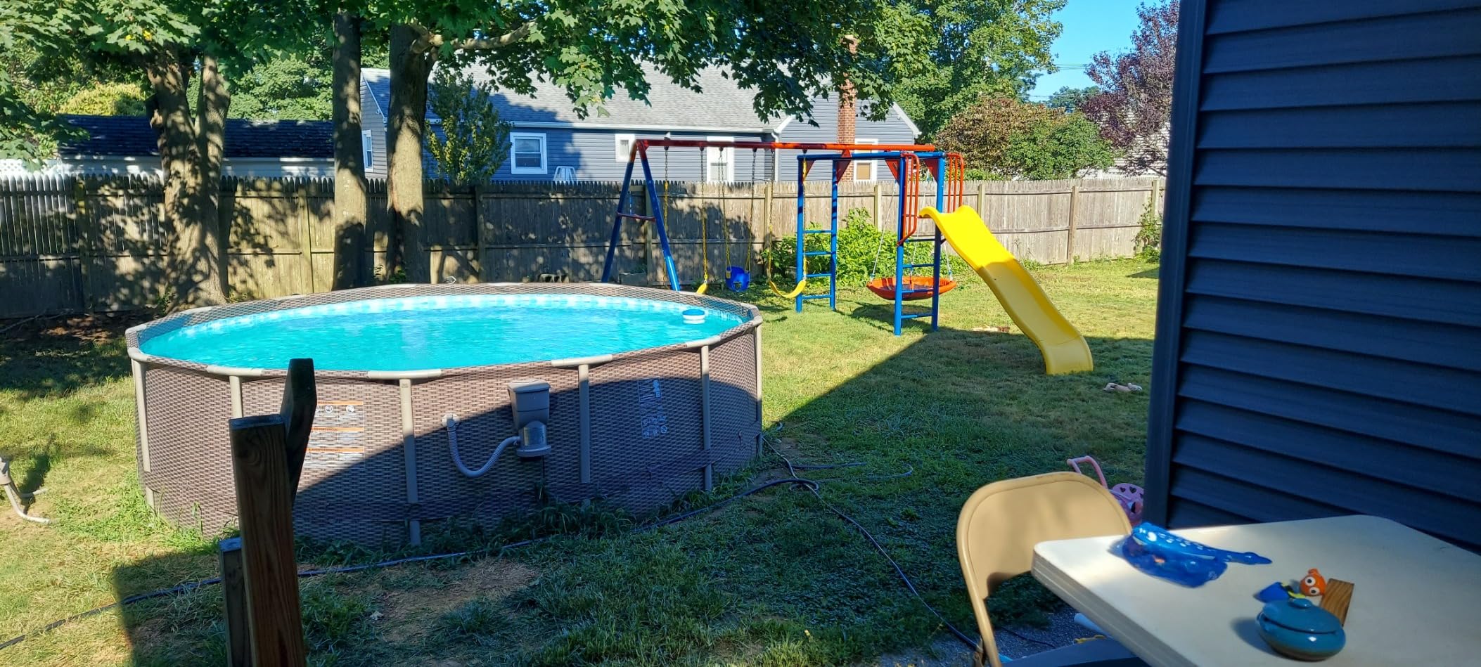 Lifetime 91028 Monkey Bar Adventure Swing Set with 3 Swings, Trapeze Bar, 9-Foot Slide and Fireman's Pole, Earthtone customer photo 2
