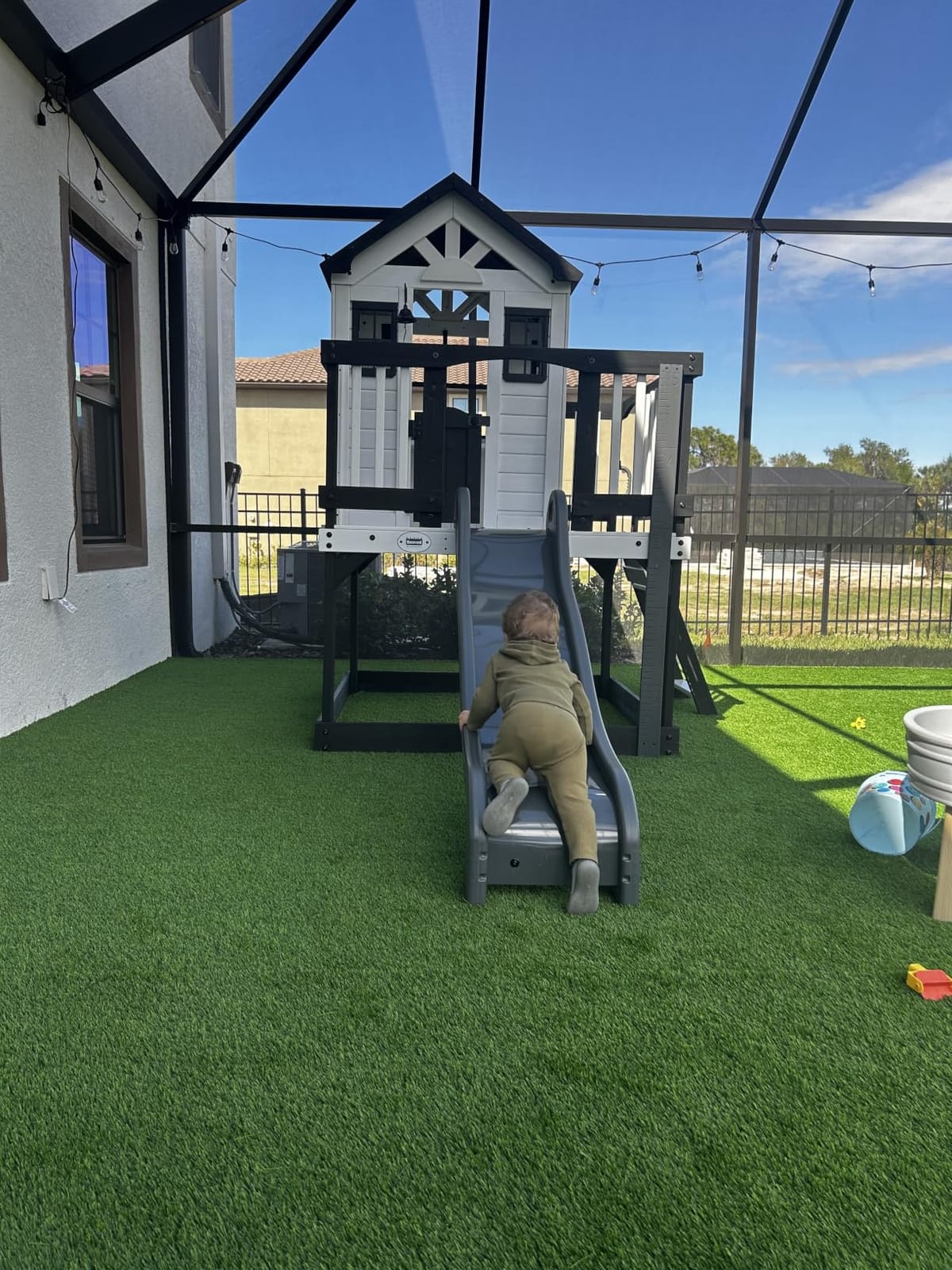 Backyard Discovery Echo Heights Elevated Cedar Wooden Kids Playhouse with Wave Slide, Play Kitchen, Wrap-Around Deck customer photo 2