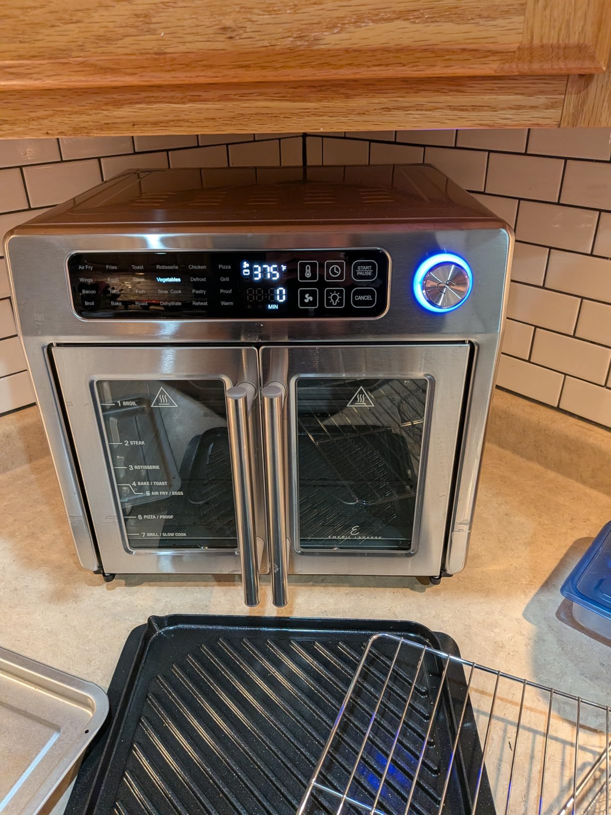 Emeril Lagasse 26QT French Door Multi-Function Air Fryer Toaster Oven | 26QT air fryer oven with French doors, 24 cooking functions, dual-speed fan and rotisserie for easy family meals. customer photo 2