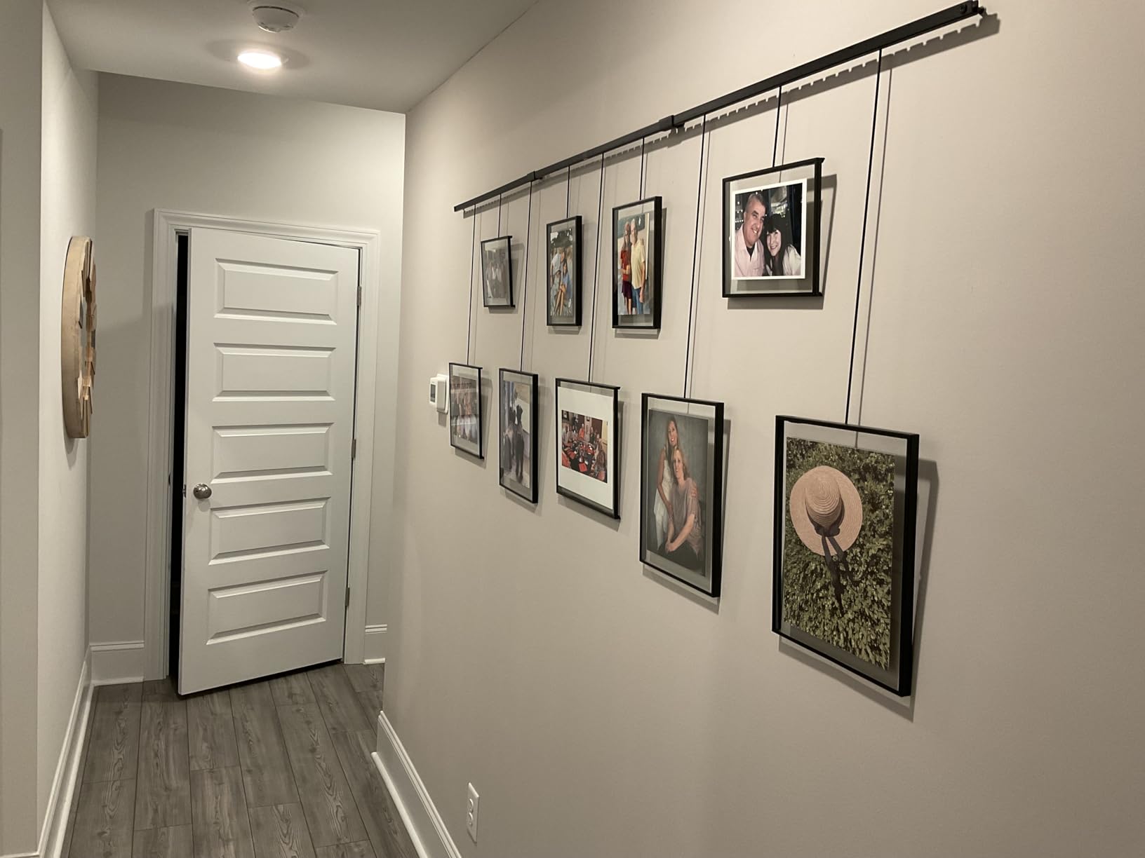 Umbra Exhibit Gallery Picture Frames, Adjustable Wall, Set of 9, Black | Steel, movable hanging rods, holds 8x10 and 5x7 sizes, mounting hardware included customer photo 2