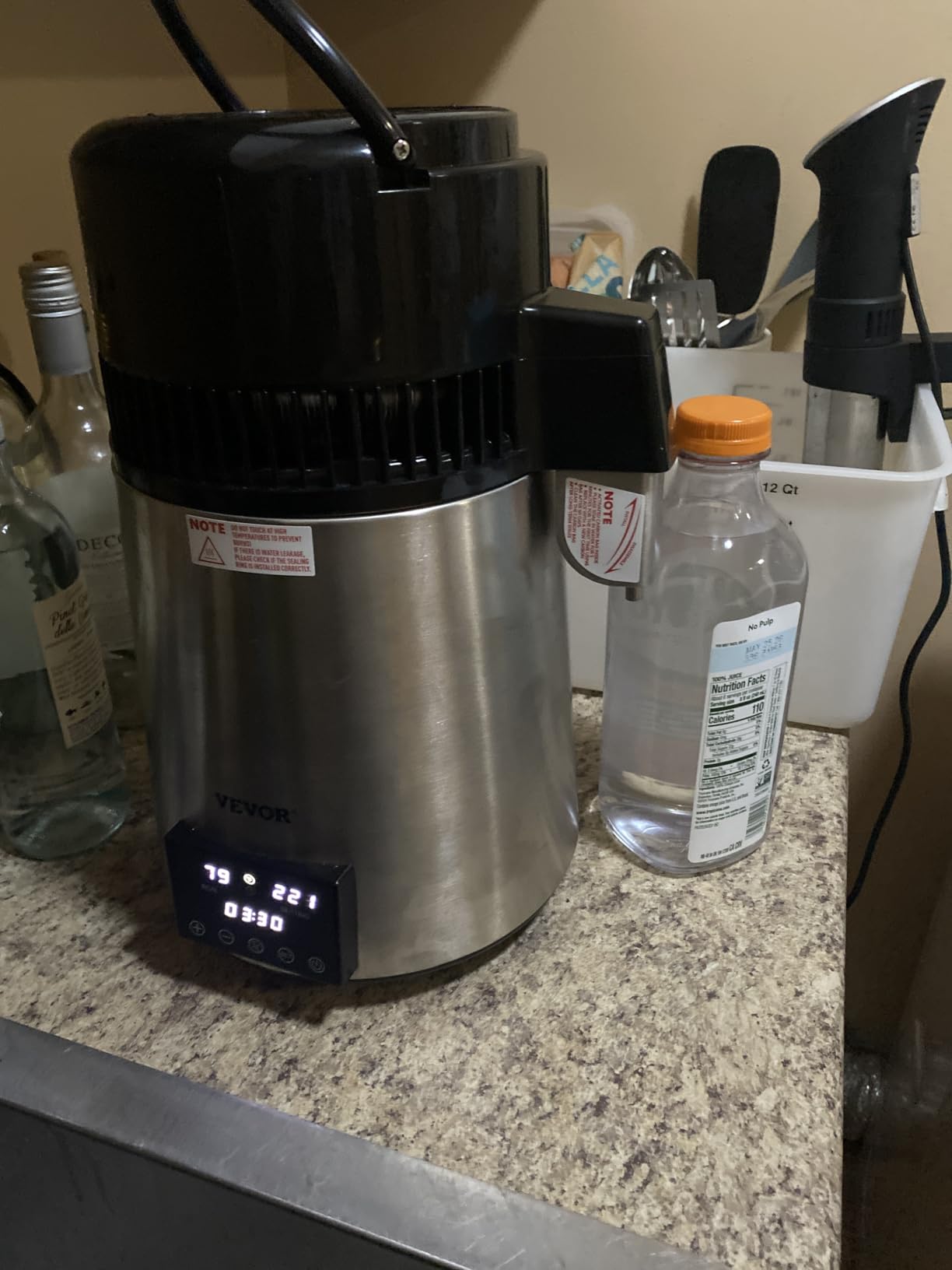 VEVOR Water Distiller, 304 Stainless Steel Countertop Water Stiller, 0.3Gal/H, 0-99H Timing Dual Temp Display, 1.1Gal Distilled Water Maker Machine, Glass Carafe, 3 Carbon Bags, Citric Acid Powder customer photo 1
