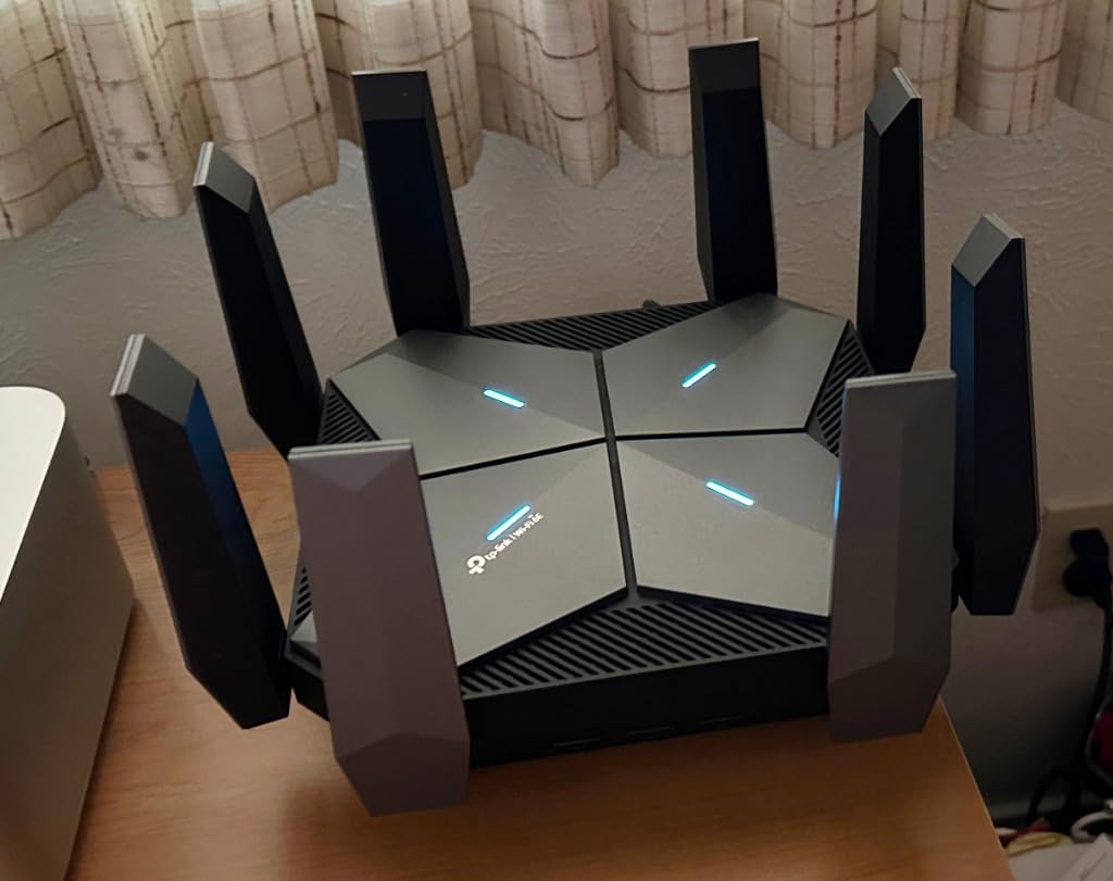 TP-Link AXE16000 Quad-Band WiFi 6E Router (Archer AXE300) customer photo 1