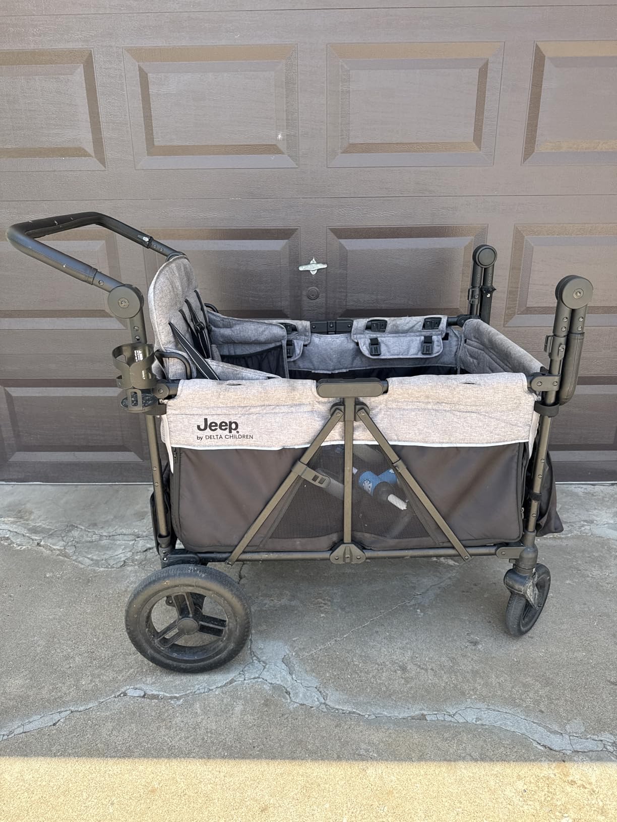 Jeep Wrangler Deluxe 4 Seater Stroller Wagon by Delta Children - Premium Quad Stroller Wagon for 4 Kids with Convertible Seats, Adjustable Push/Pull Handles, Removable Canopy & Flat Fold, Grey customer photo 1