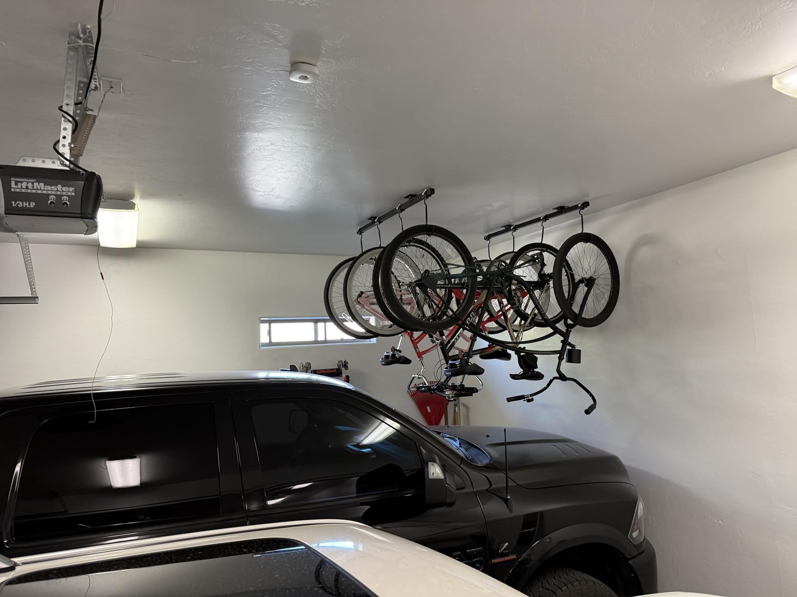 Teal Triangle Adjustable Ceiling Mounted Bike Rack for Garage, Hold 8 Bikes | Ceiling Bike Hanger, Hanging Bike Rack for Garage, Rubber Coated Hooks, Holds 8 Bikes customer photo 2