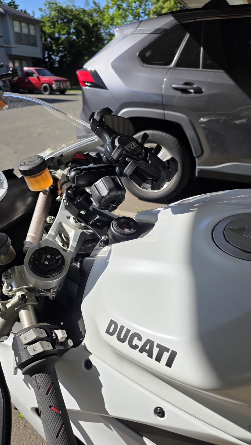 RAM Quick-Grip Pro Motorcycle Phone Holder with Vibration Damper | B Size 1 inch ball mount for smartphones and GPS devices, spring-loaded one-handed operation customer photo 1