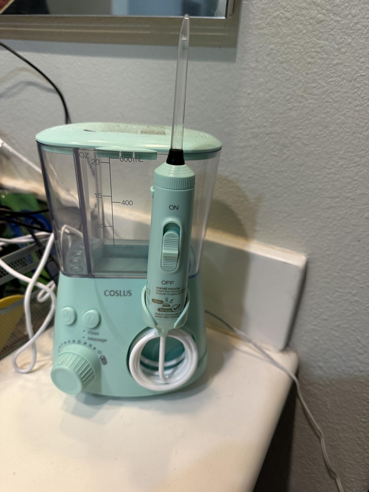 COSLUS E2 Water Dental Flosser for Teeth Cleaning, Multi-User Family Use | 12 Pressure Settings & 2 Modes for Orthodontic, Braces, Sensitive, Patented Storage, 5 Jet Tips and 600ML Tank Home, Green customer photo 2