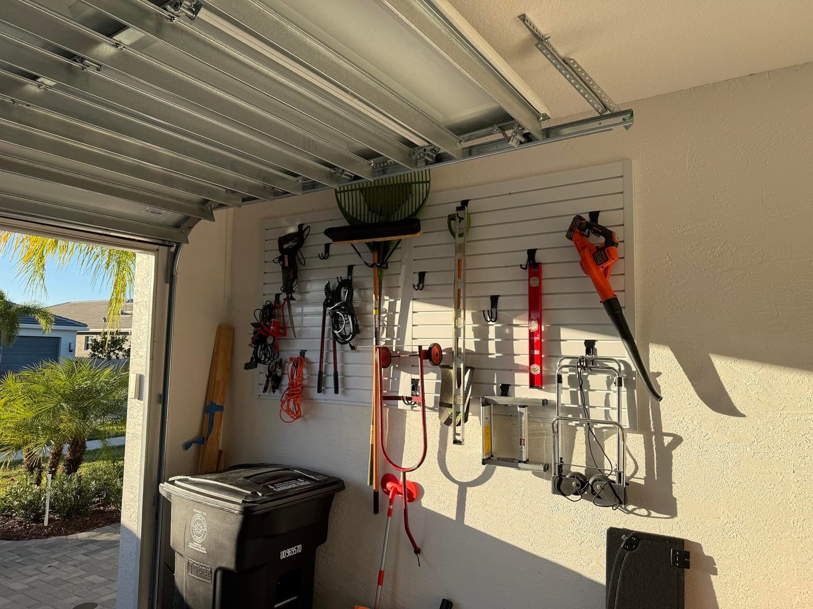 Ezlaino Slatwall 4 FT x 8 FT, PVC Slat Wall Paneling Garage Wall Organizer | Upgraded & Thickened for Long-Lasting Durability, Compatible with Slatwall Accessories, For Garage Storage & Display, White customer photo 1