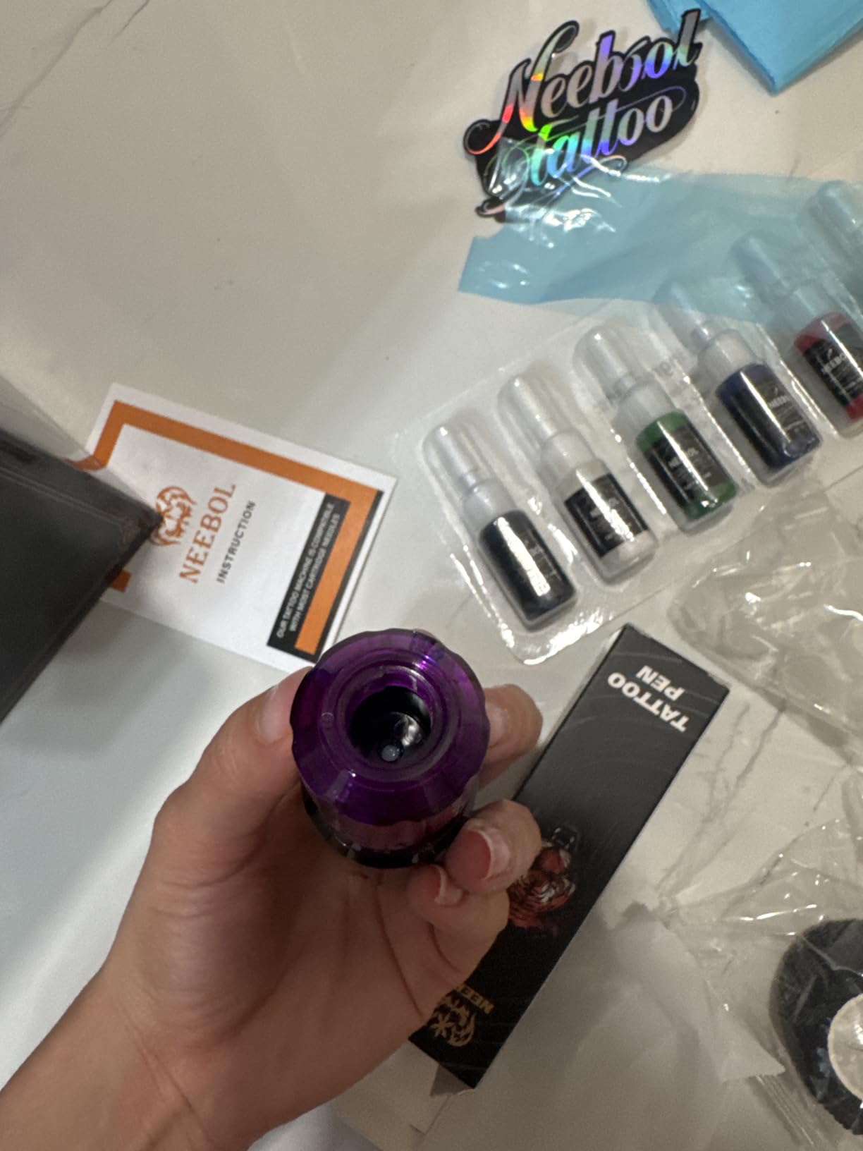 Neebol Wireless Tattoo Gun Kit, 2PCS Batteries Set for Beginners & Artists | Purple Dual 1600mAh Tattoo Machine kit 20 Cartridge Needles & 8 Color Inks, Full Tattoo Supplies for Home & Studio practice customer photo 1