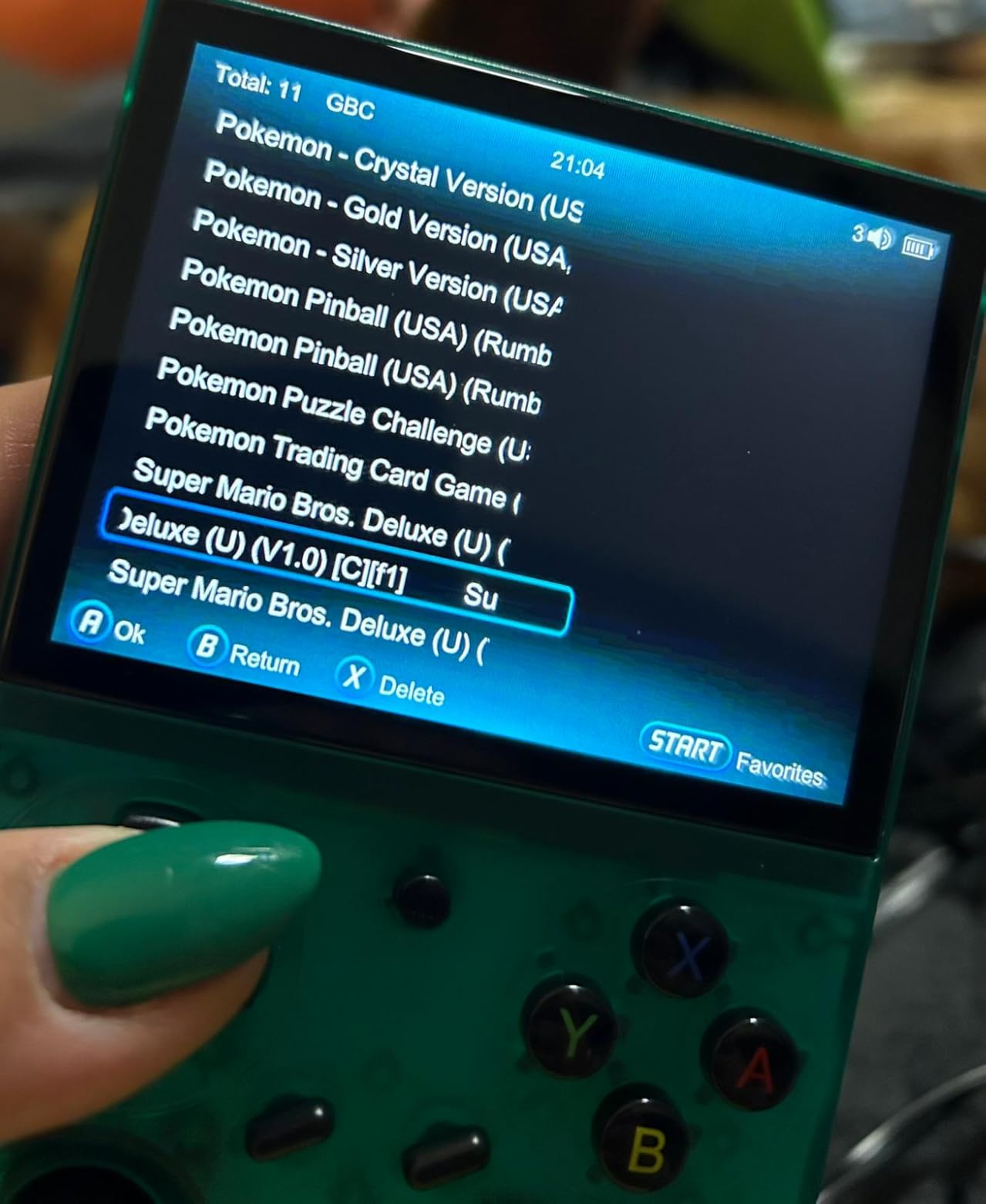 RG35XX Pro - Retro Handheld Game Console, 3.5-Inch IPS Screen, Linux OS, 64GB Card, 3200mAh Battery, WiFi & Bluetooth, HDMI Output, Includes Screen Protector & Keychain (Transparent Teal) customer photo 1