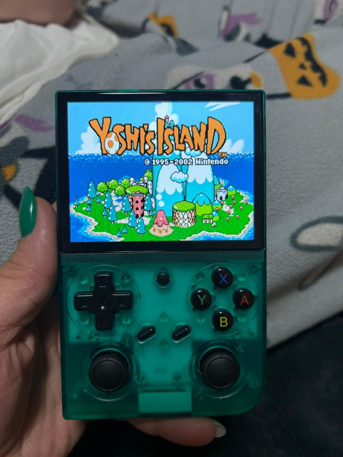RG35XX Pro - Retro Handheld Game Console, 3.5-Inch IPS Screen, Linux OS, 64GB Card, 3200mAh Battery, WiFi & Bluetooth, HDMI Output, Includes Screen Protector & Keychain (Transparent Teal) customer photo 2